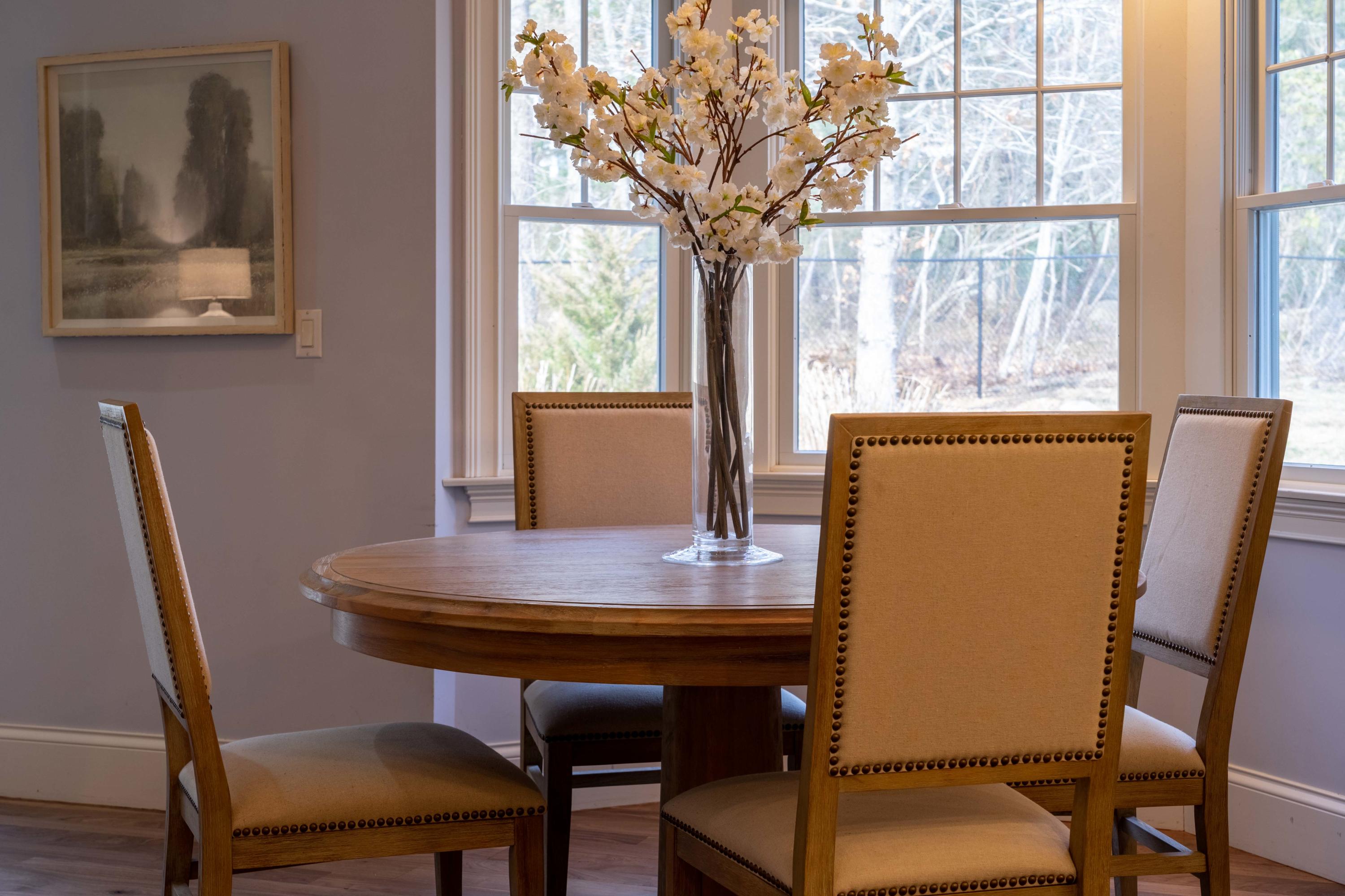5 Pasture Road Cataumet, MA 02534 - Photo 12 of 52 a view of a dining room with furniture window and wooden floor