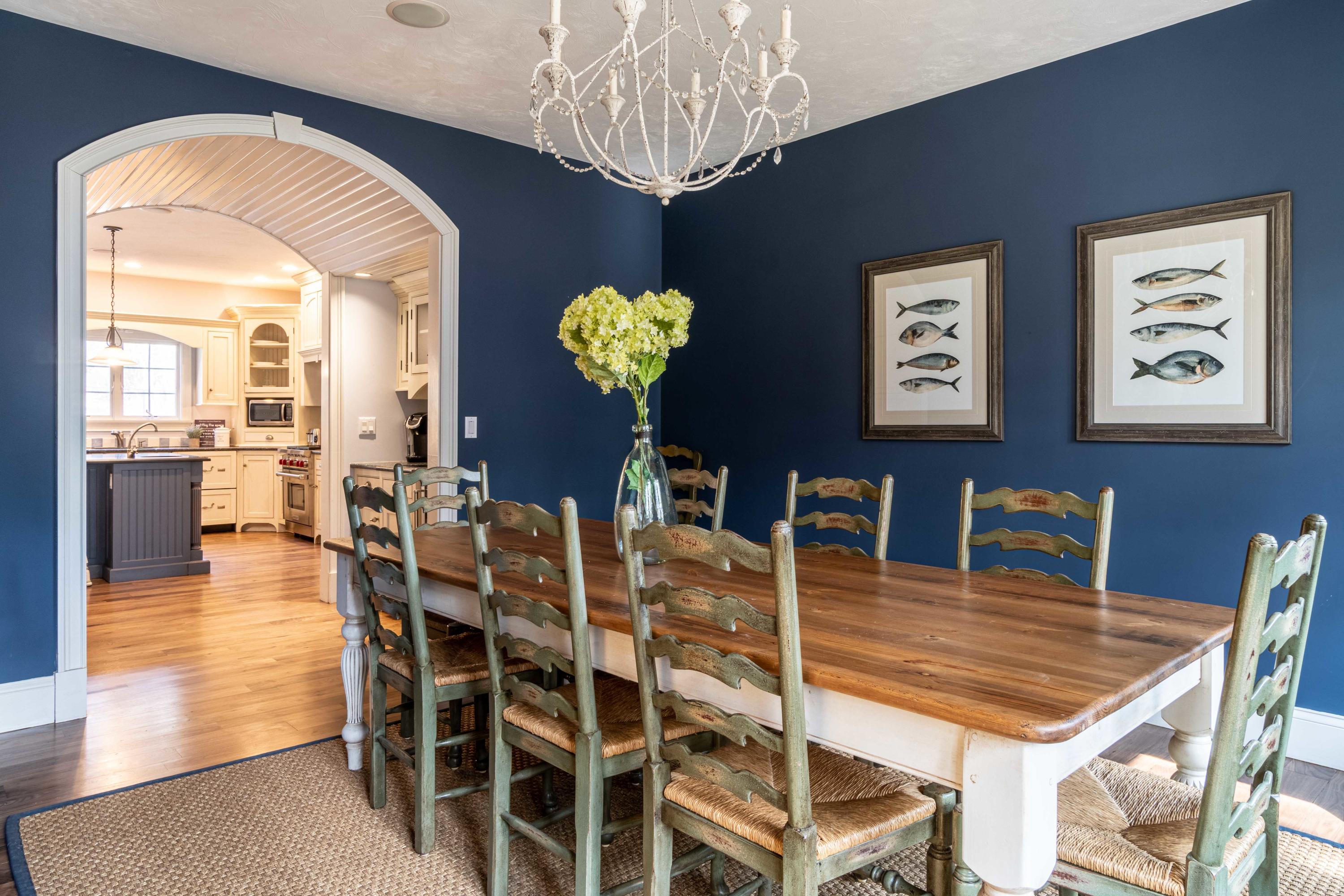 5 Pasture Road Cataumet, MA 02534 - Photo 13 of 52 a dining room with furniture a chandelier and wooden floor