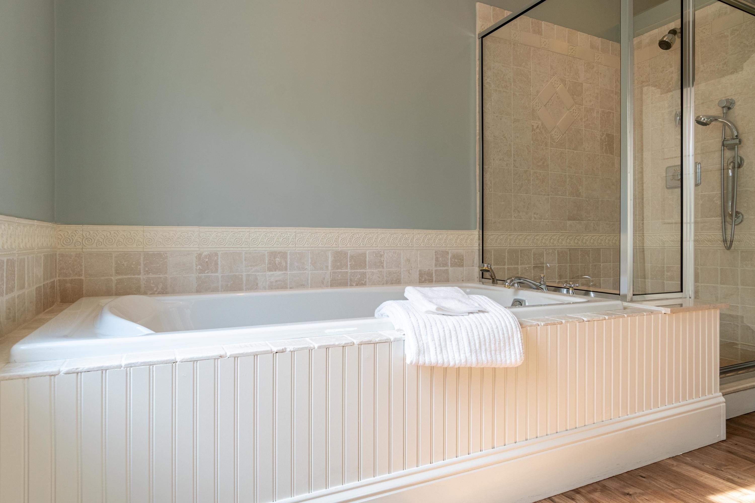 5 Pasture Road Cataumet, MA 02534 - Photo 21 of 52 a bathroom with a bathtub