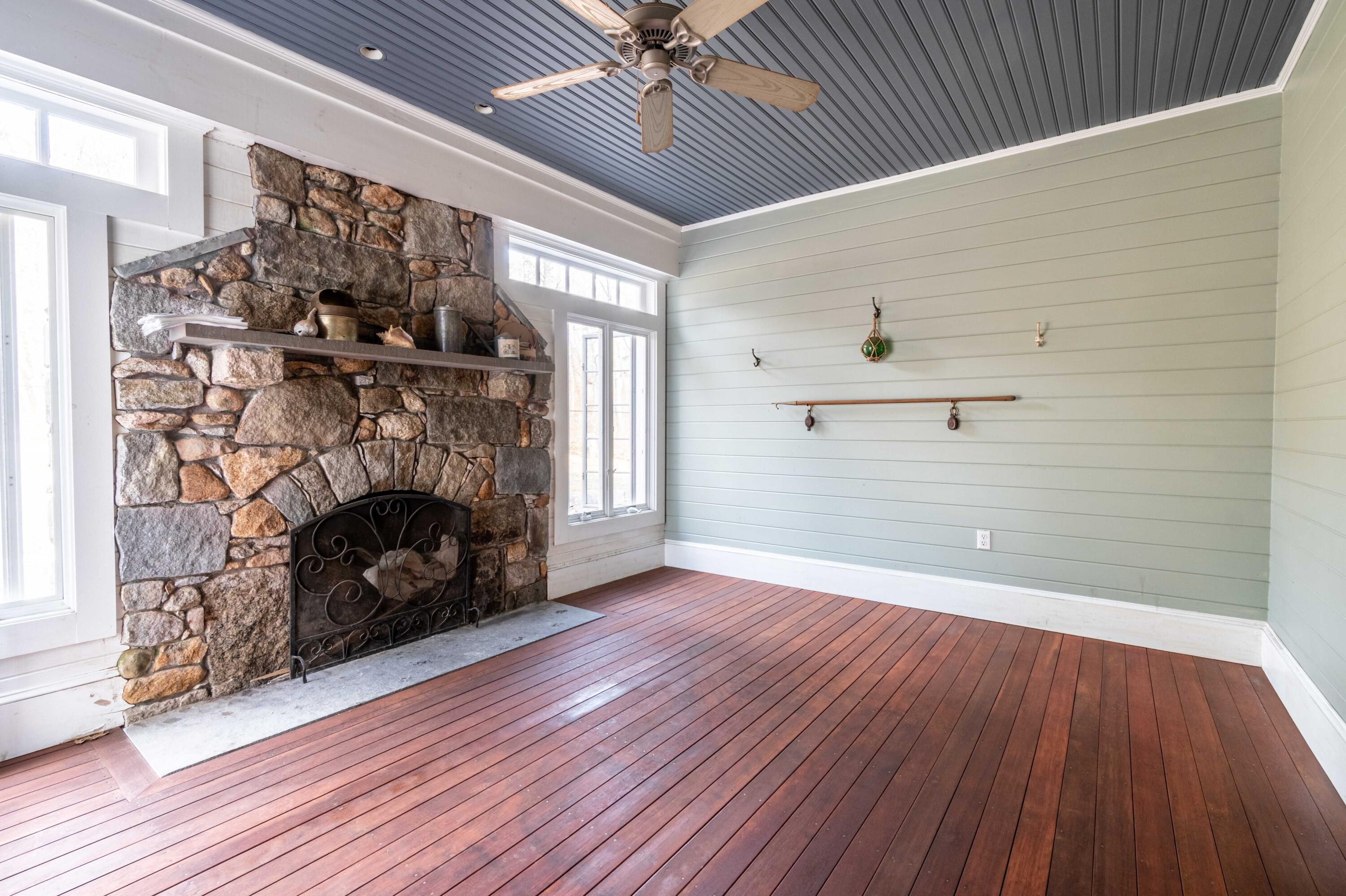 5 Pasture Road Cataumet, MA 02534 - Photo 24 of 52 a view of an empty room with wooden floor fireplace and a window