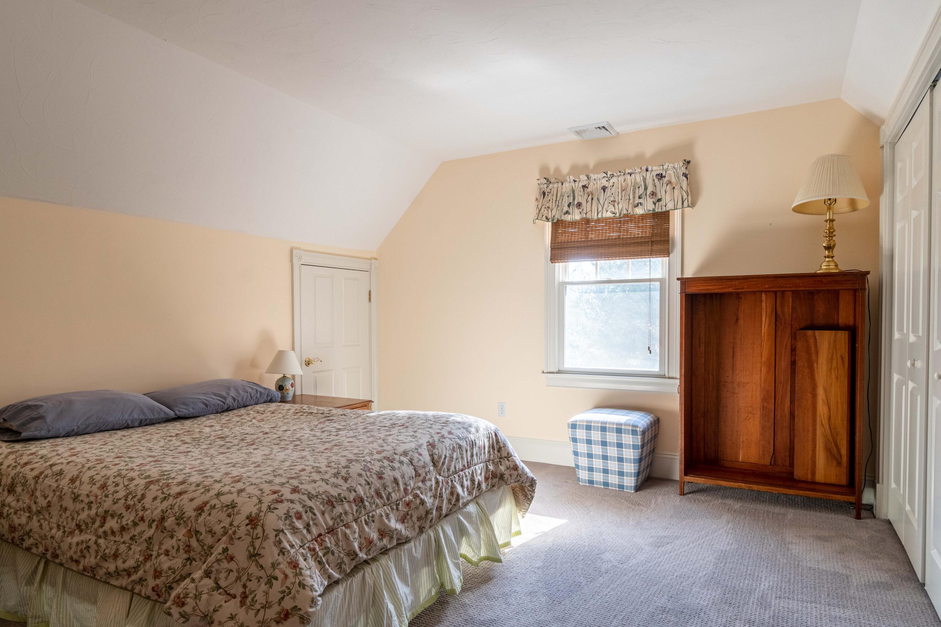 5 Pasture Road Cataumet, MA 02534 - Photo 29 of 52 a bedroom with a bed and a window