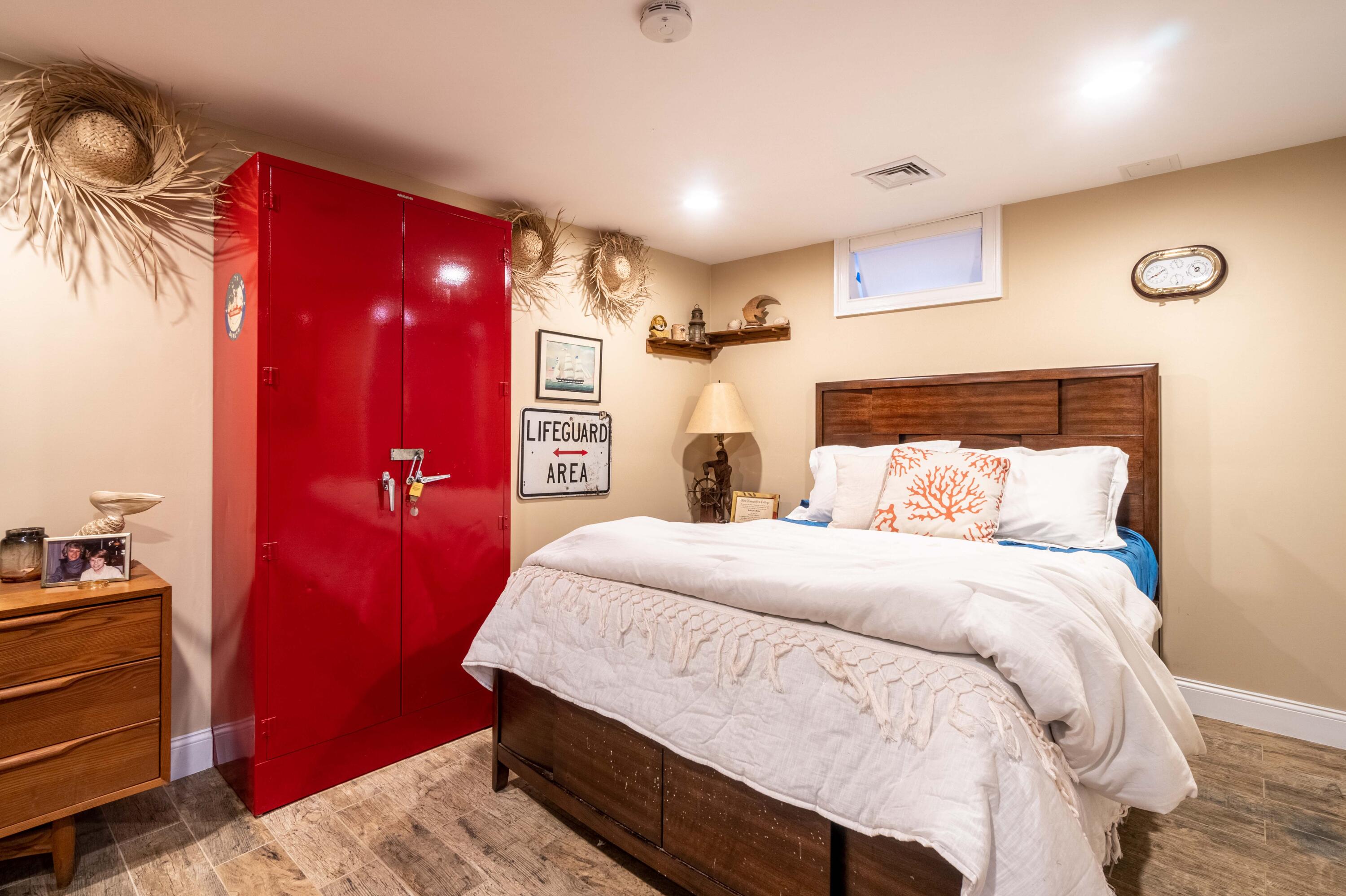 5 Pasture Road Cataumet, MA 02534 - Photo 31 of 52 a bedroom with a bed and a mirror