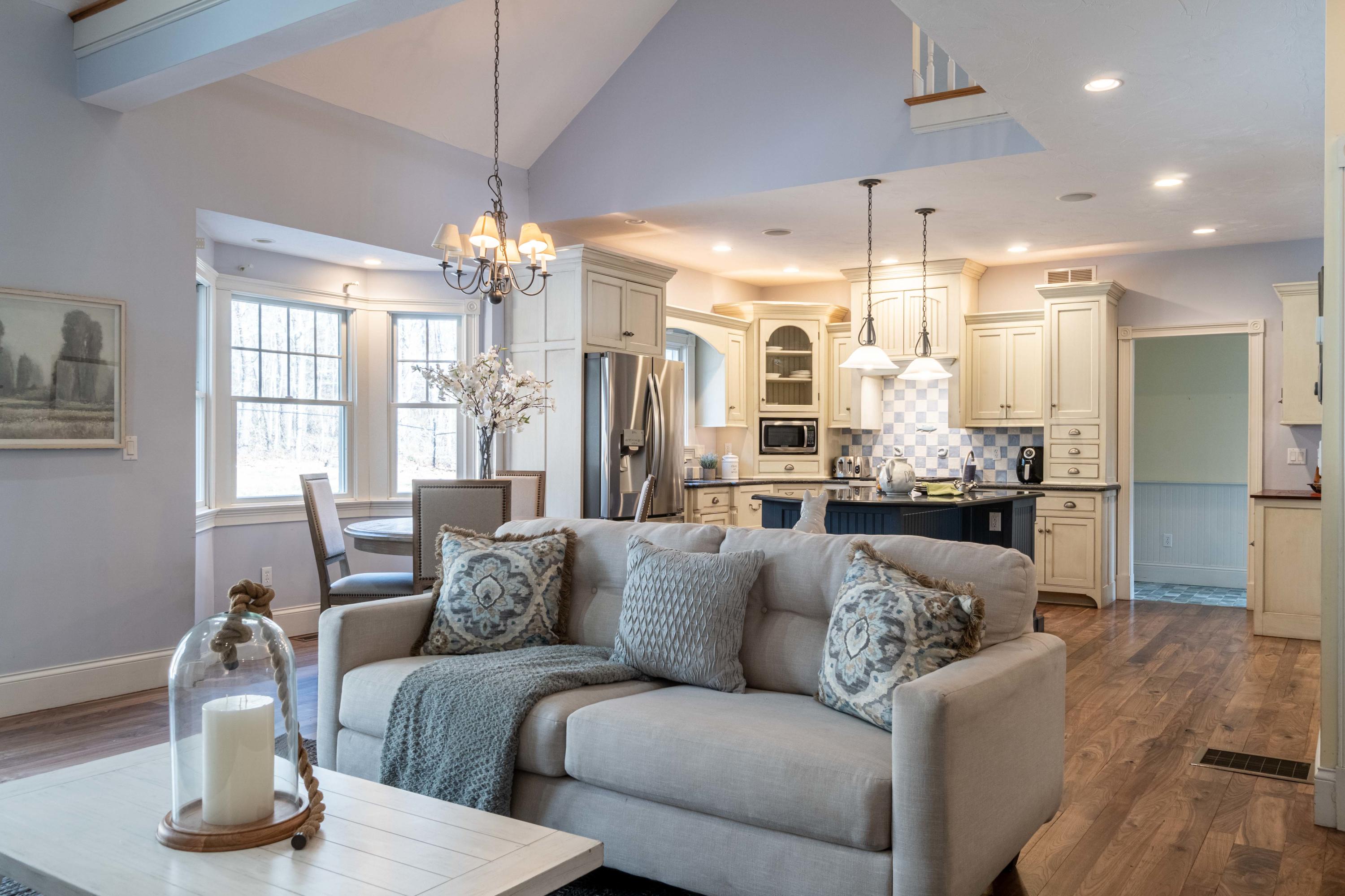 5 Pasture Road Cataumet, MA 02534 - Photo 4 of 52 a living room with furniture and a chandelier