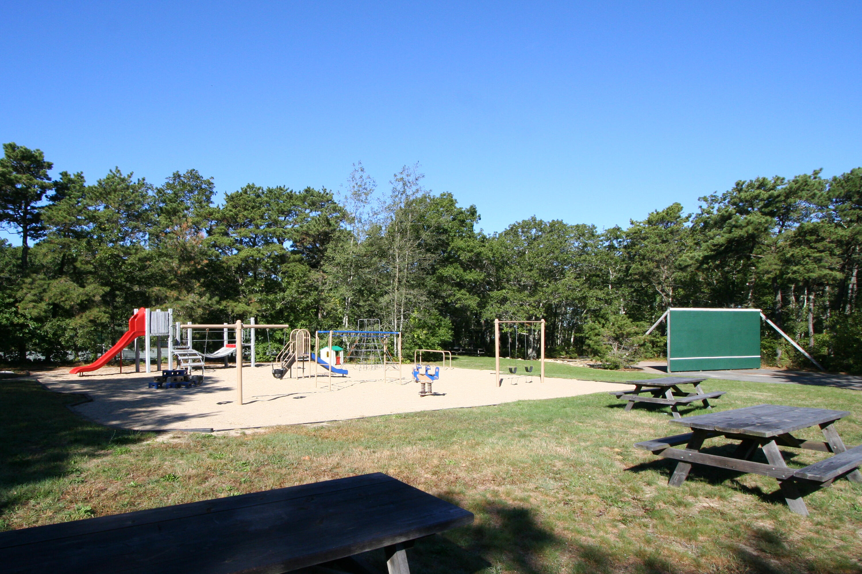 5 Pasture Road Cataumet, MA 02534 - Photo 42 of 52 a view of a swimming pool with lawn chairs