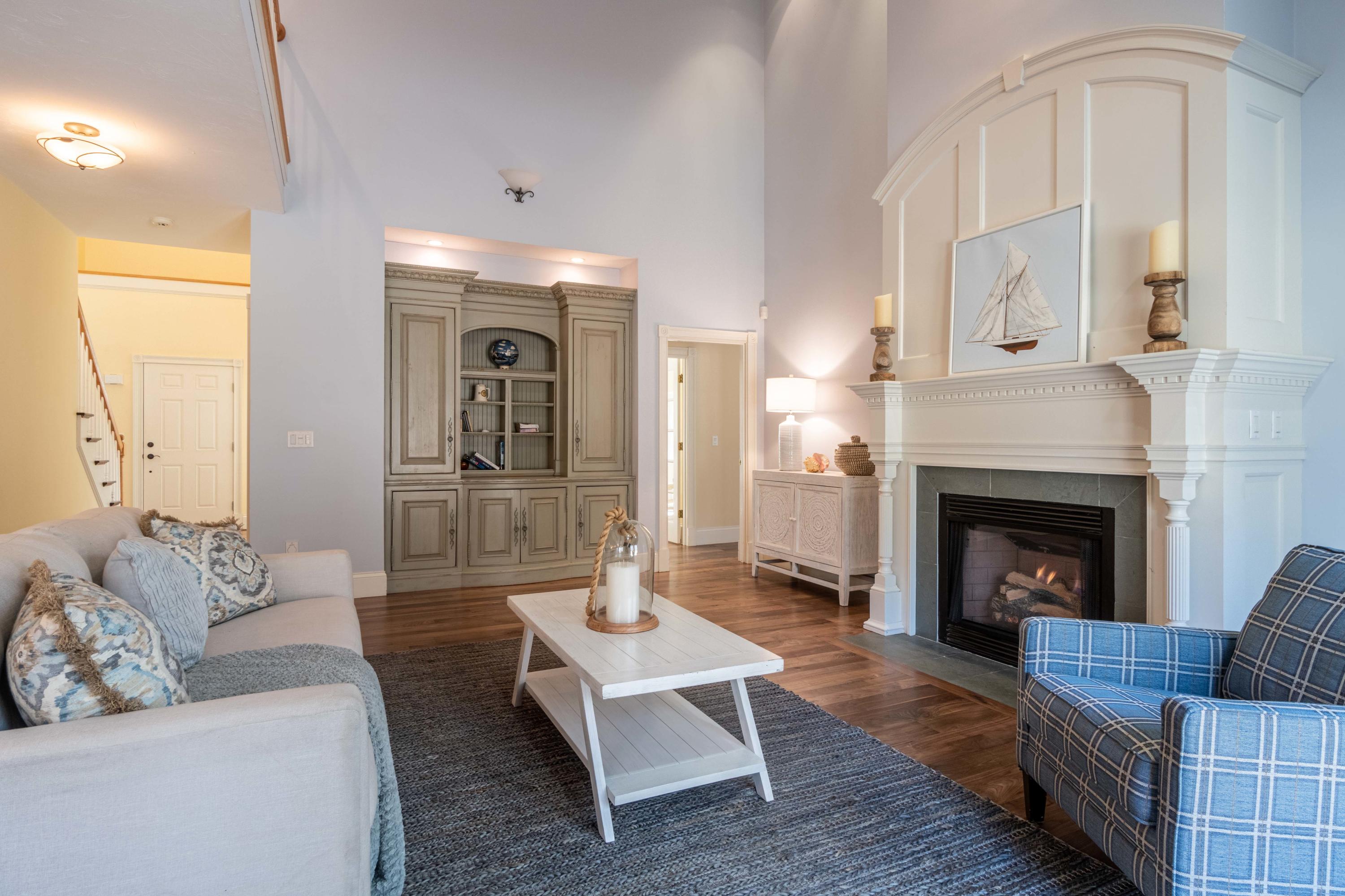5 Pasture Road Cataumet, MA 02534 - Photo 5 of 52 a living room with furniture and a fireplace