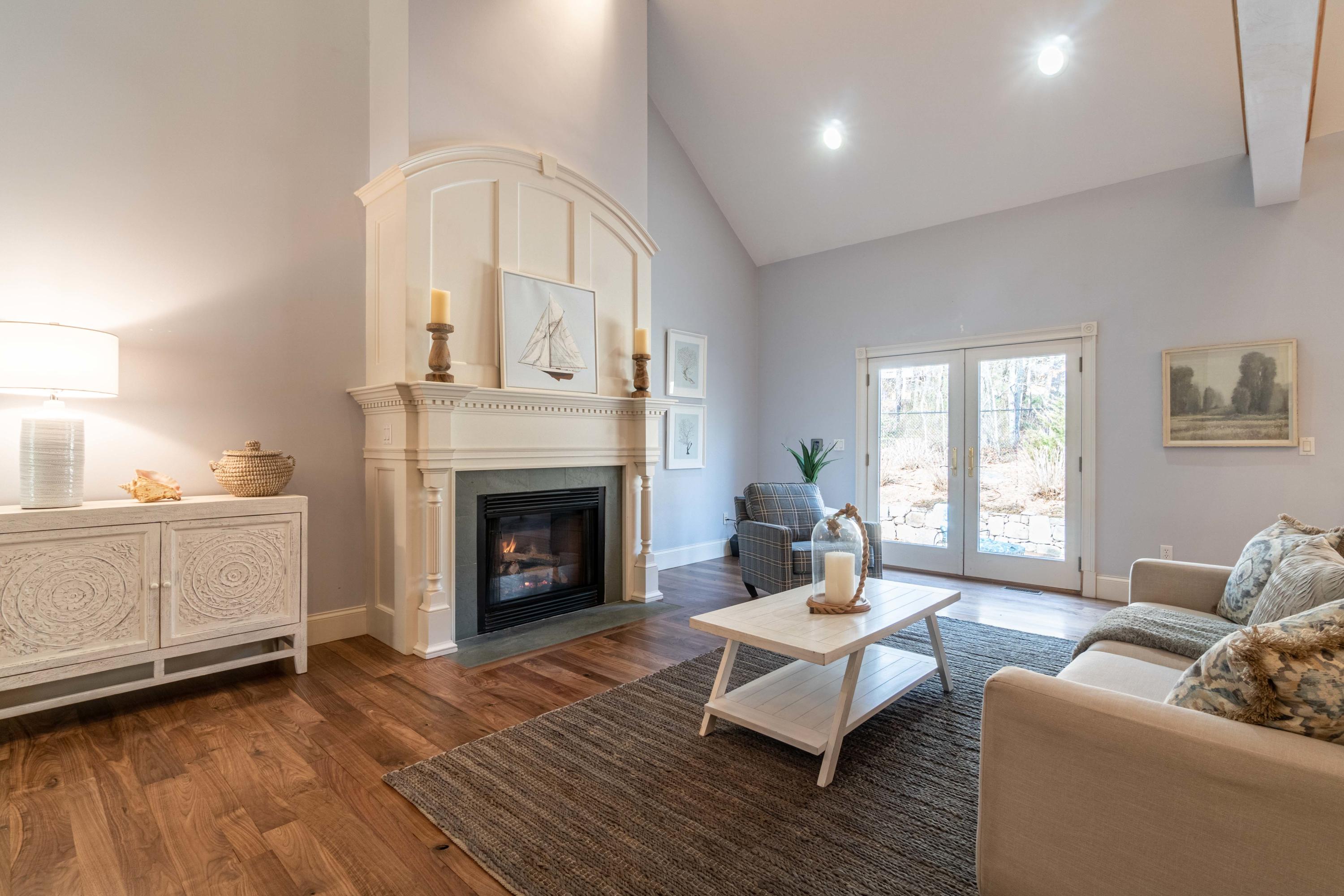 5 Pasture Road Cataumet, MA 02534 - Photo 7 of 52 a living room with furniture and a fireplace