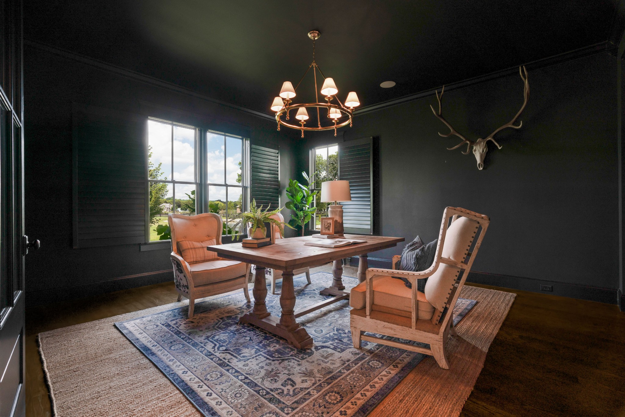 4108 Trinity Road College Grove, TN 37046 - Photo 19 of 70 a view of a dining room with furniture a chandelier and wooden floor