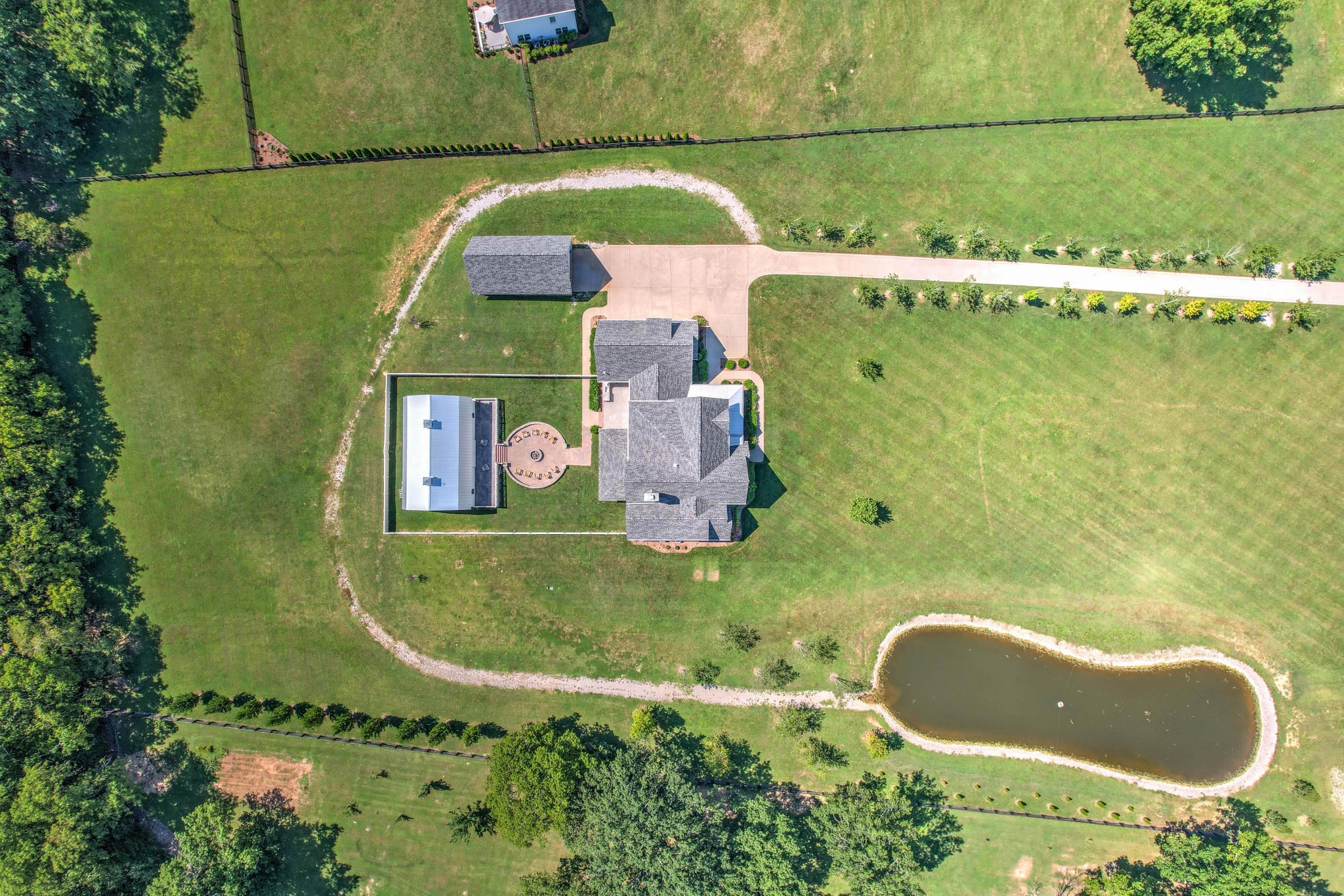 4108 Trinity Road College Grove, TN 37046 - Photo 2 of 70 an aerial view of a house with a swimming pool