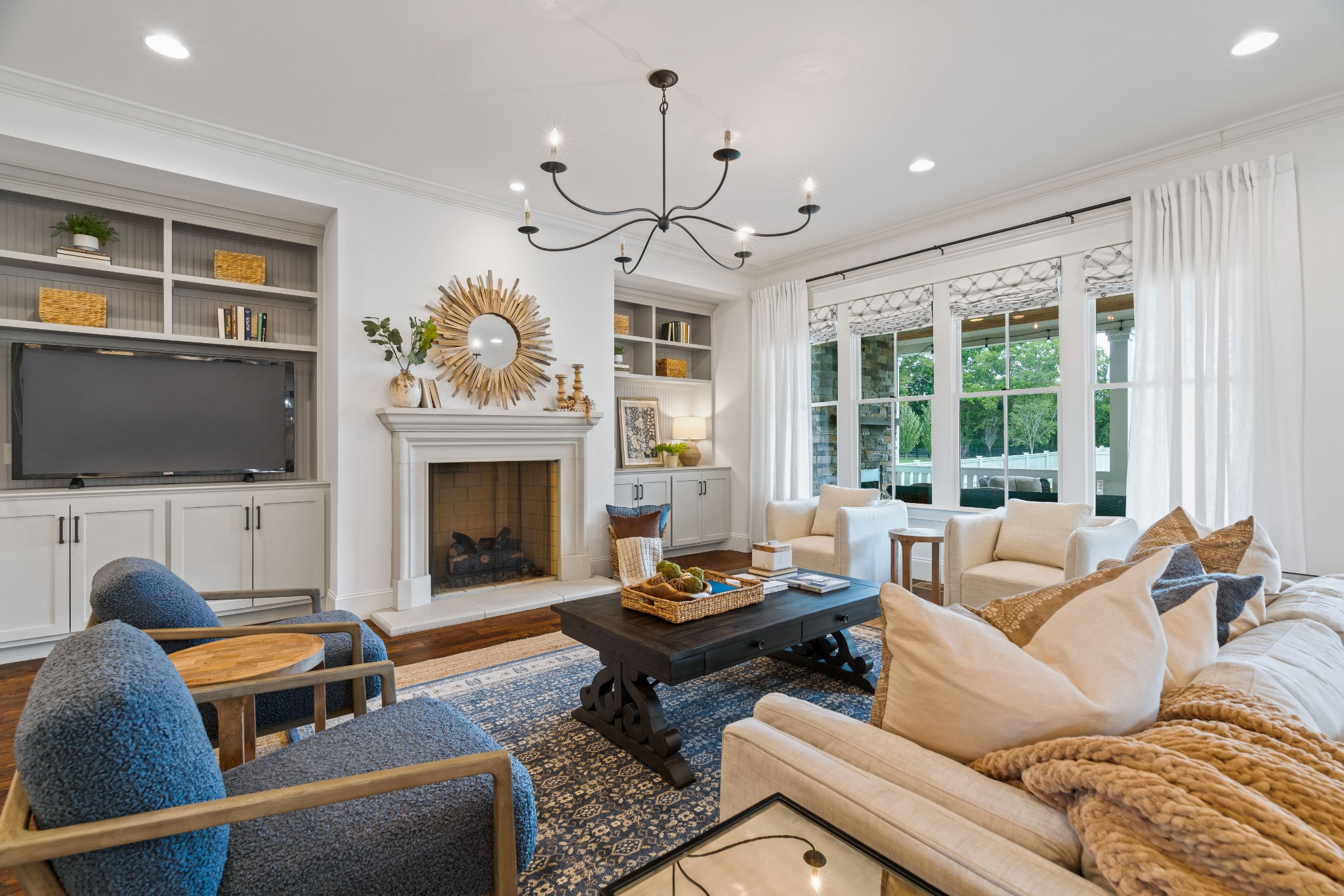 4108 Trinity Road College Grove, TN 37046 - Photo 35 of 70 a living room with furniture a flat screen tv and a fireplace