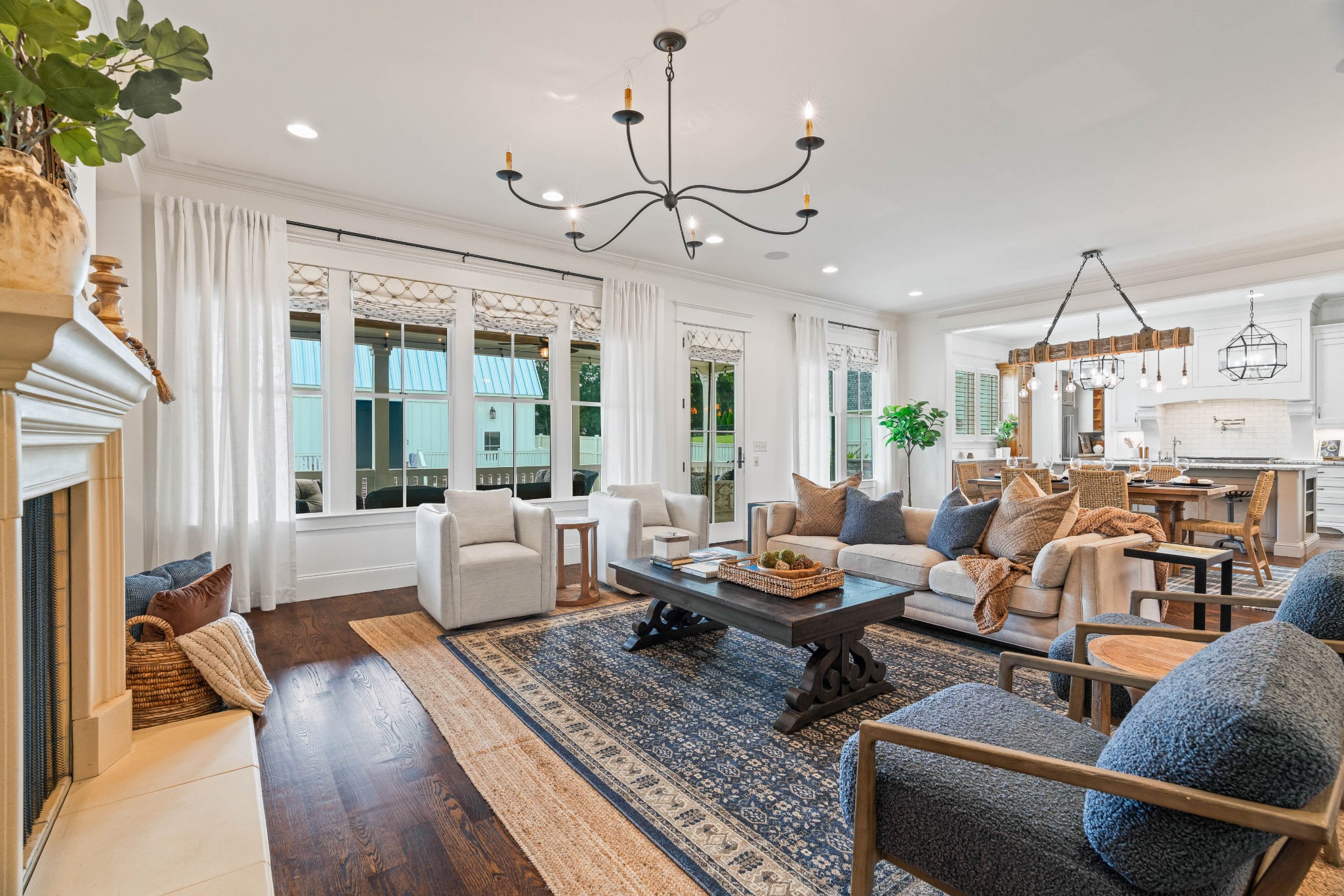 4108 Trinity Road College Grove, TN 37046 - Photo 38 of 70 a living room with furniture a fireplace and a chandelier