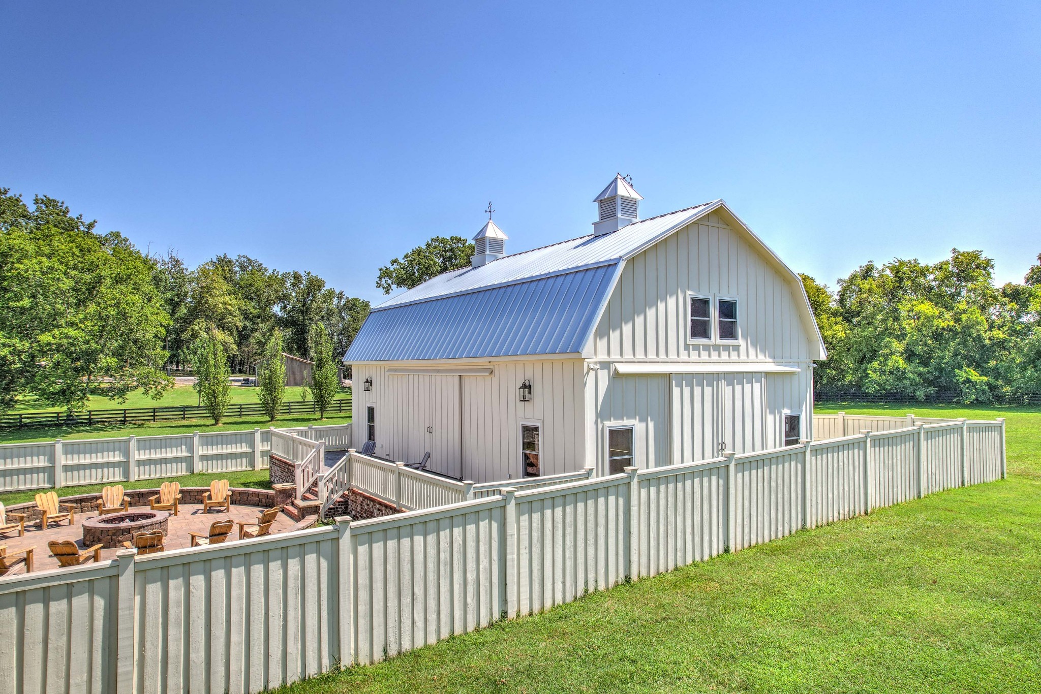 4108 Trinity Road College Grove, TN 37046 - Photo 6 of 70 a view of a house with a small yard and wooden fence