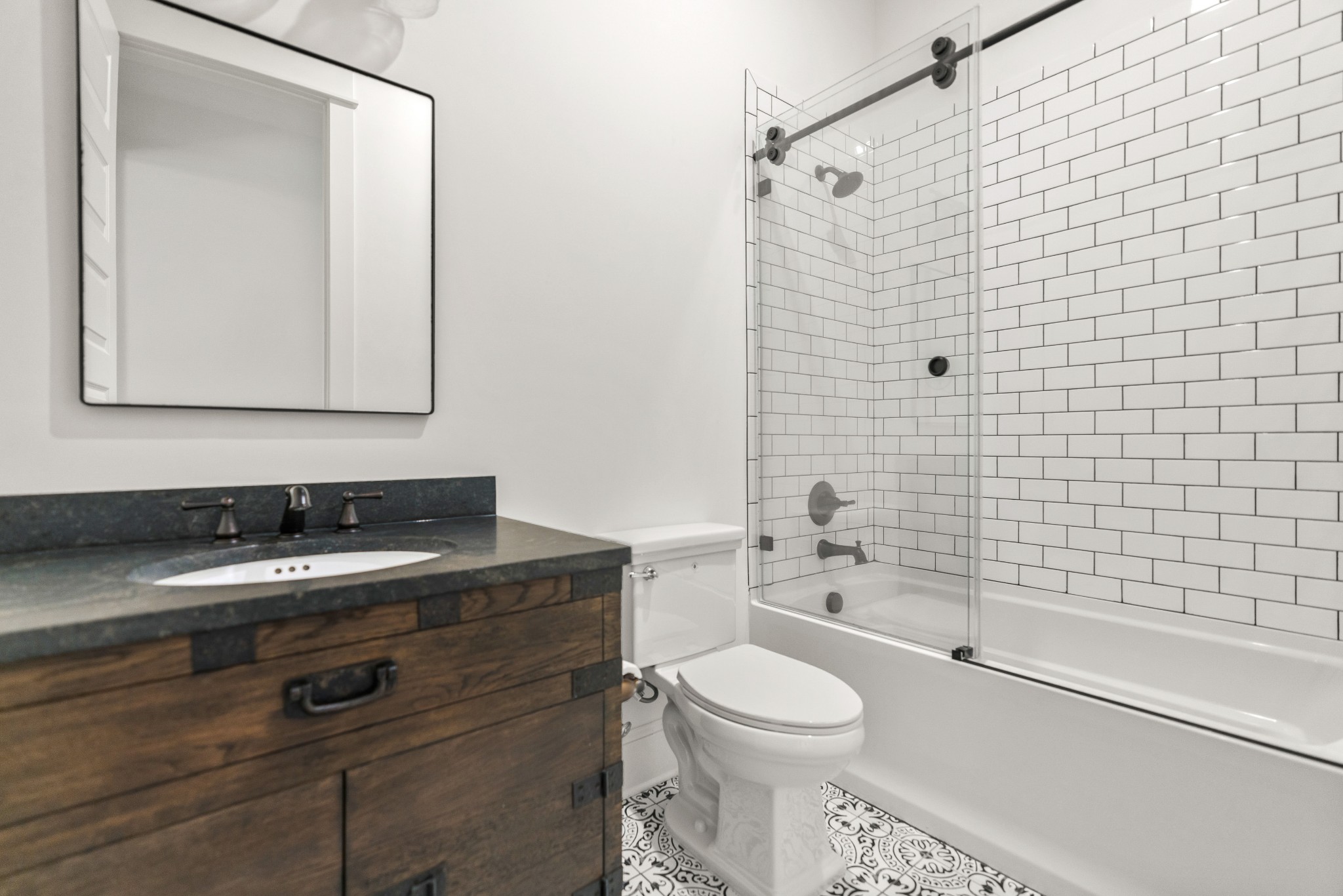 4108 Trinity Road College Grove, TN 37046 - Photo 66 of 70 a bathroom with a granite countertop sink toilet and shower