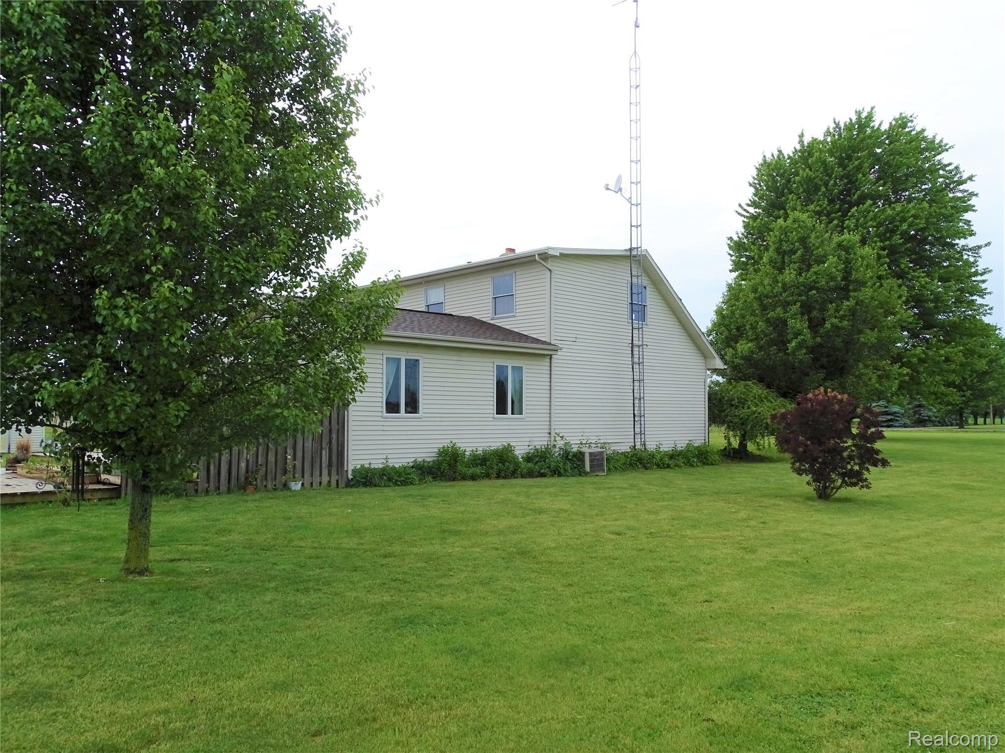 4202 East Wilson Road Clio, MI 48420 - Photo 23 of 28 Side view and antennae tower