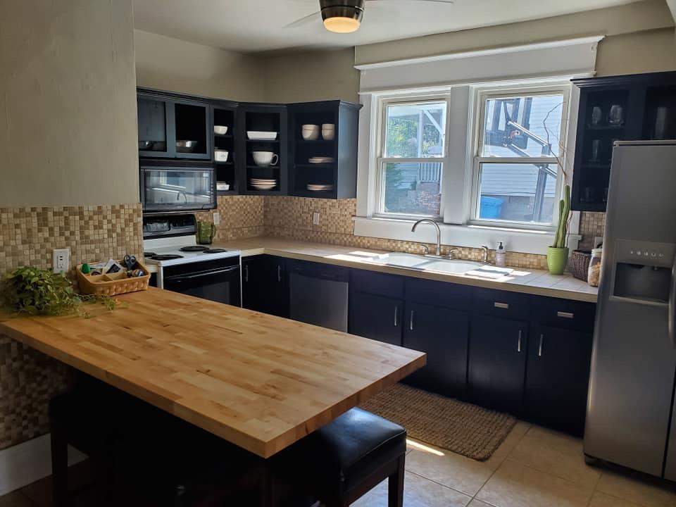 1949 Belleville Road Southwest Roanoke, VA 24015 - Photo 15 of 29 Sunny kitchen w/butcher block counter
