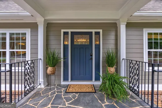a kitchen with stainless steel appliances granite countertop wooden cabinets a sink and dishwasher