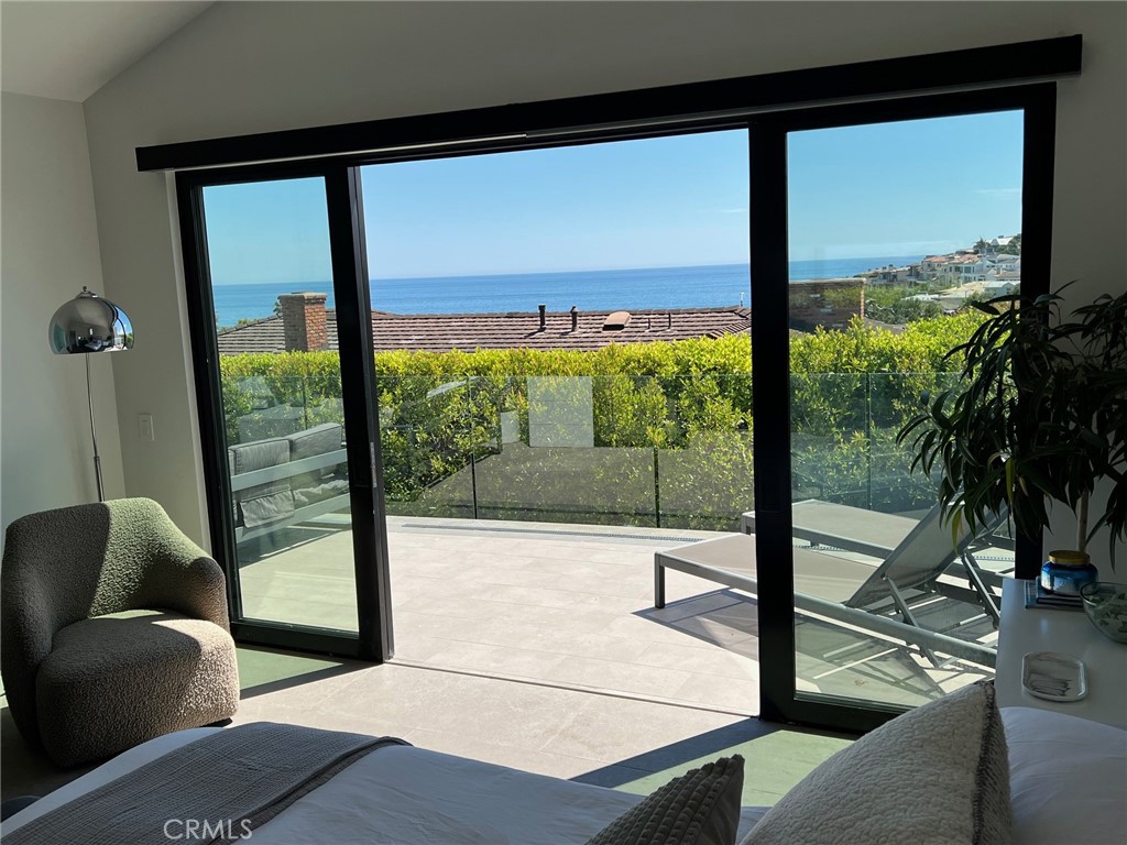 809 Emerald Bay Laguna Beach, CA 92651 - Photo 12 of 20 a view of a floor to ceiling window with an outdoor view