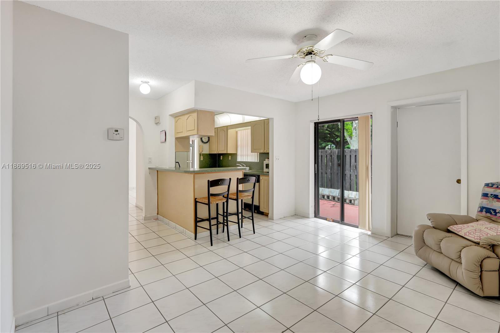 8133 Southwest 152nd Court Miami, FL 33193 - Photo 20 of 20 a view of kitchen with furniture and chandelier