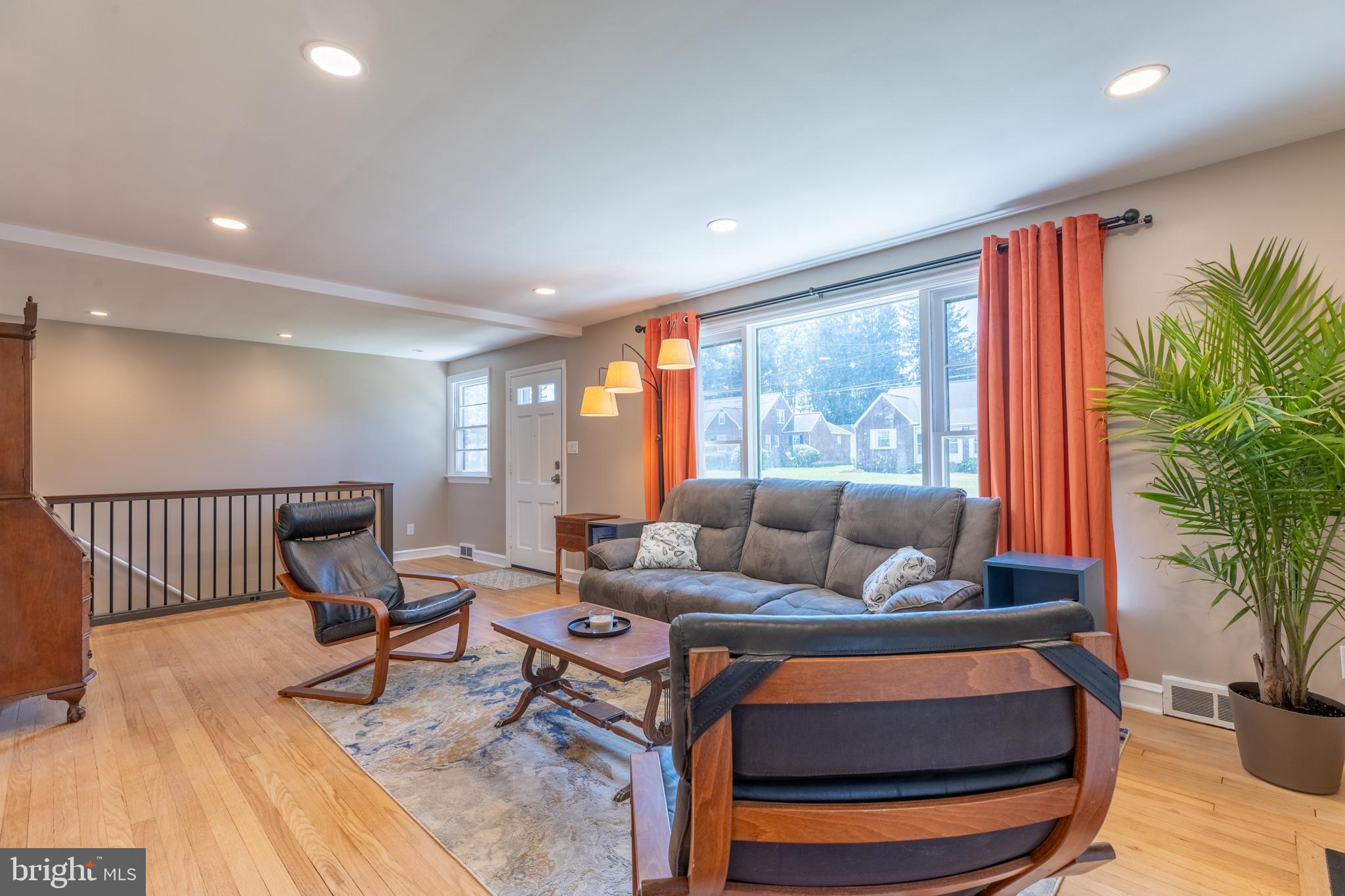 5 Lehigh Road Wilmington, DE 19808 - Photo 4 of 17 a living room with furniture and a large window