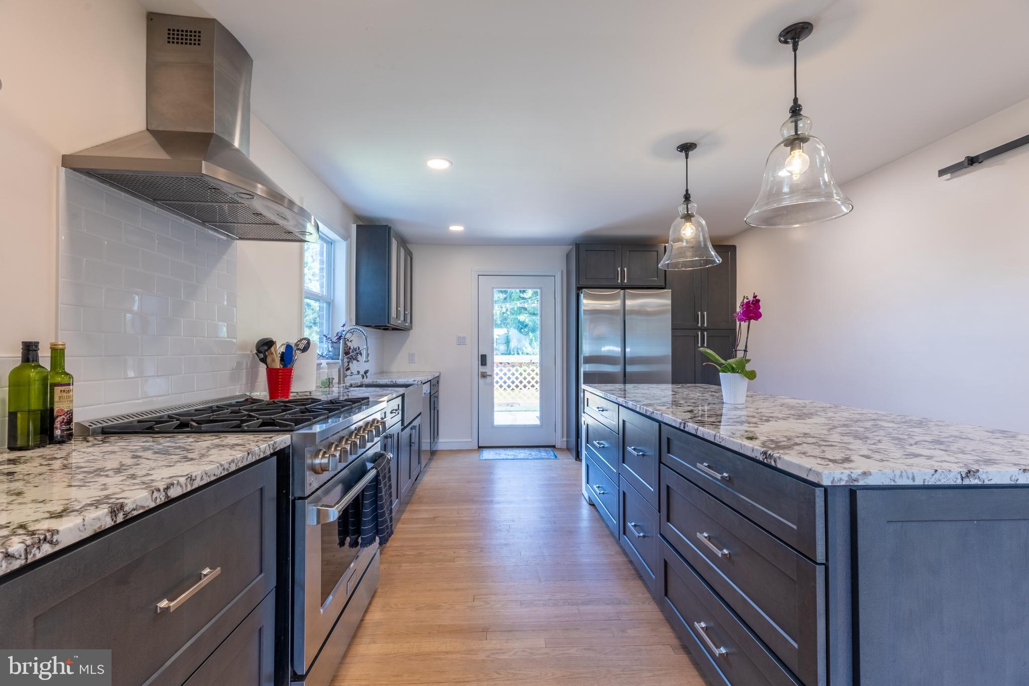 5 Lehigh Road Wilmington, DE 19808 - Photo 6 of 17 a kitchen with granite countertop lots of counter top space