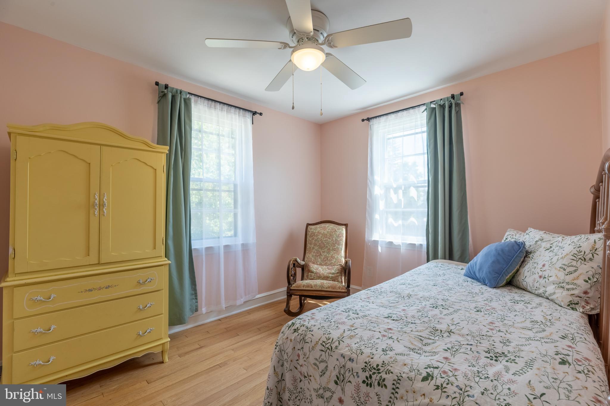 5 Lehigh Road Wilmington, DE 19808 - Photo 9 of 17 a bedroom with a bed and wooden floor