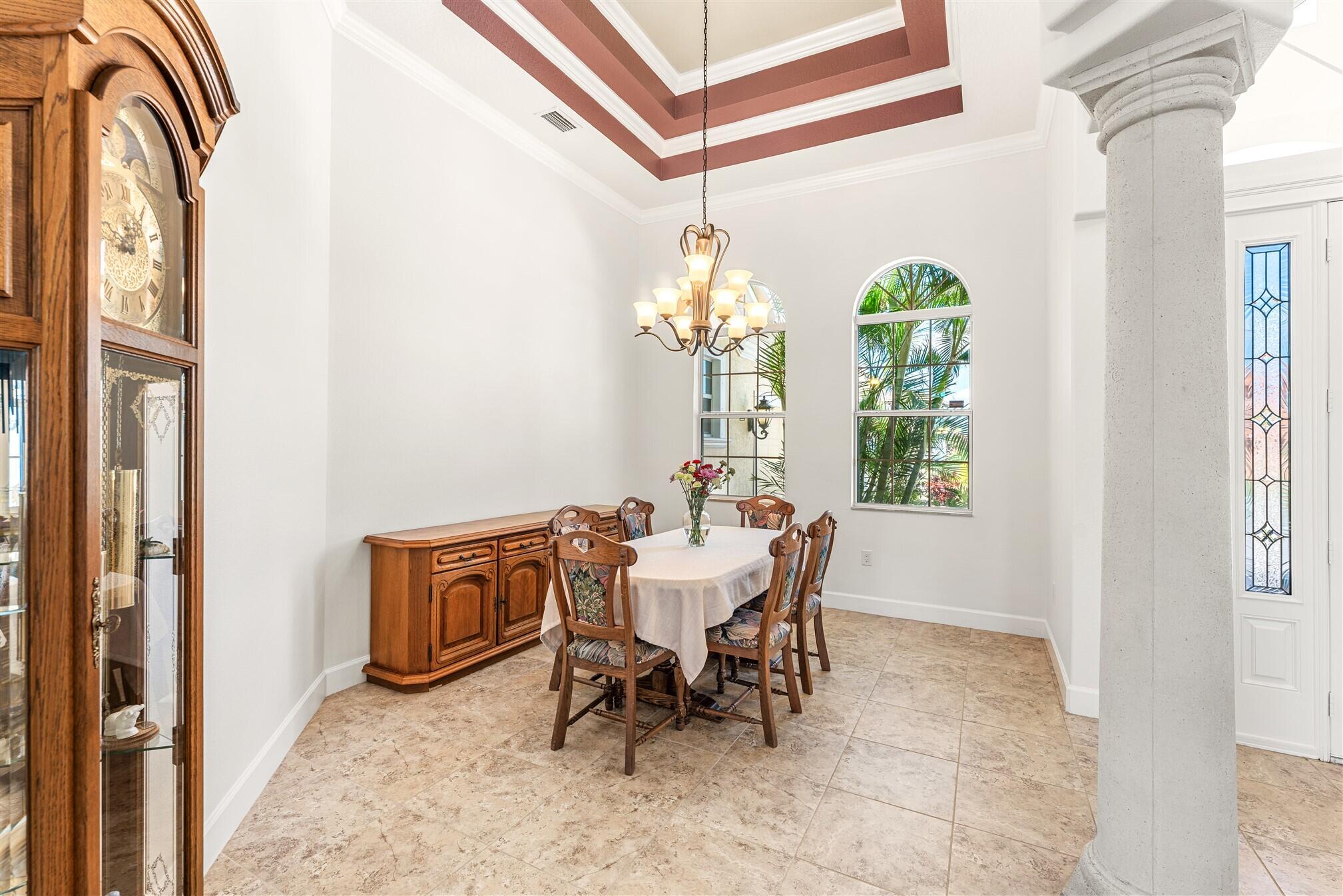 3210 Levanto Drive Melbourne, FL 32940 - Photo 11 of 76 a dining room with furniture and window