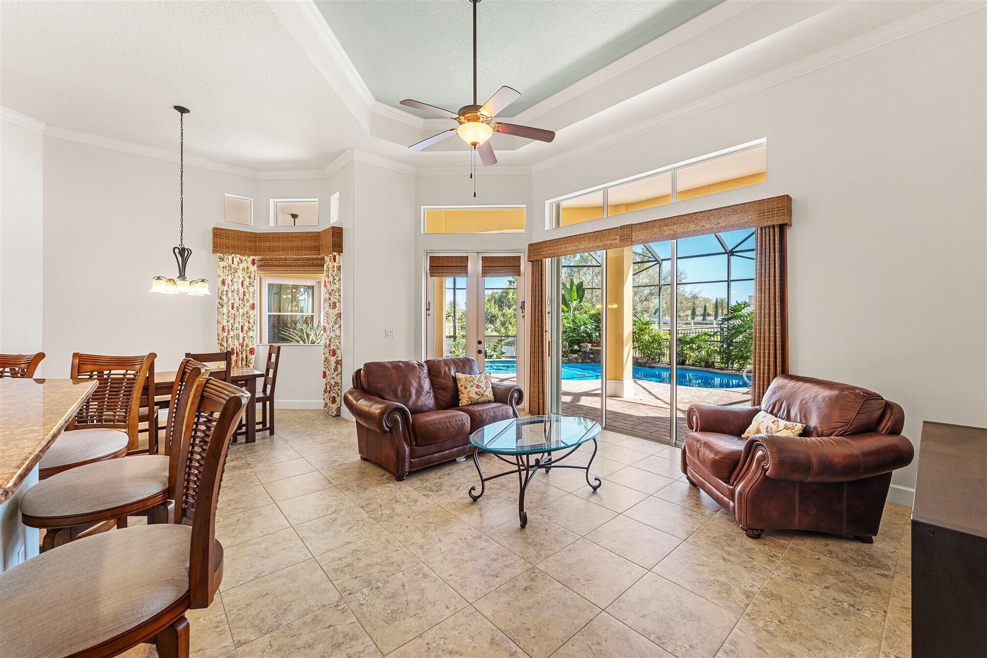 3210 Levanto Drive Melbourne, FL 32940 - Photo 31 of 76 a living room with furniture and a large window
