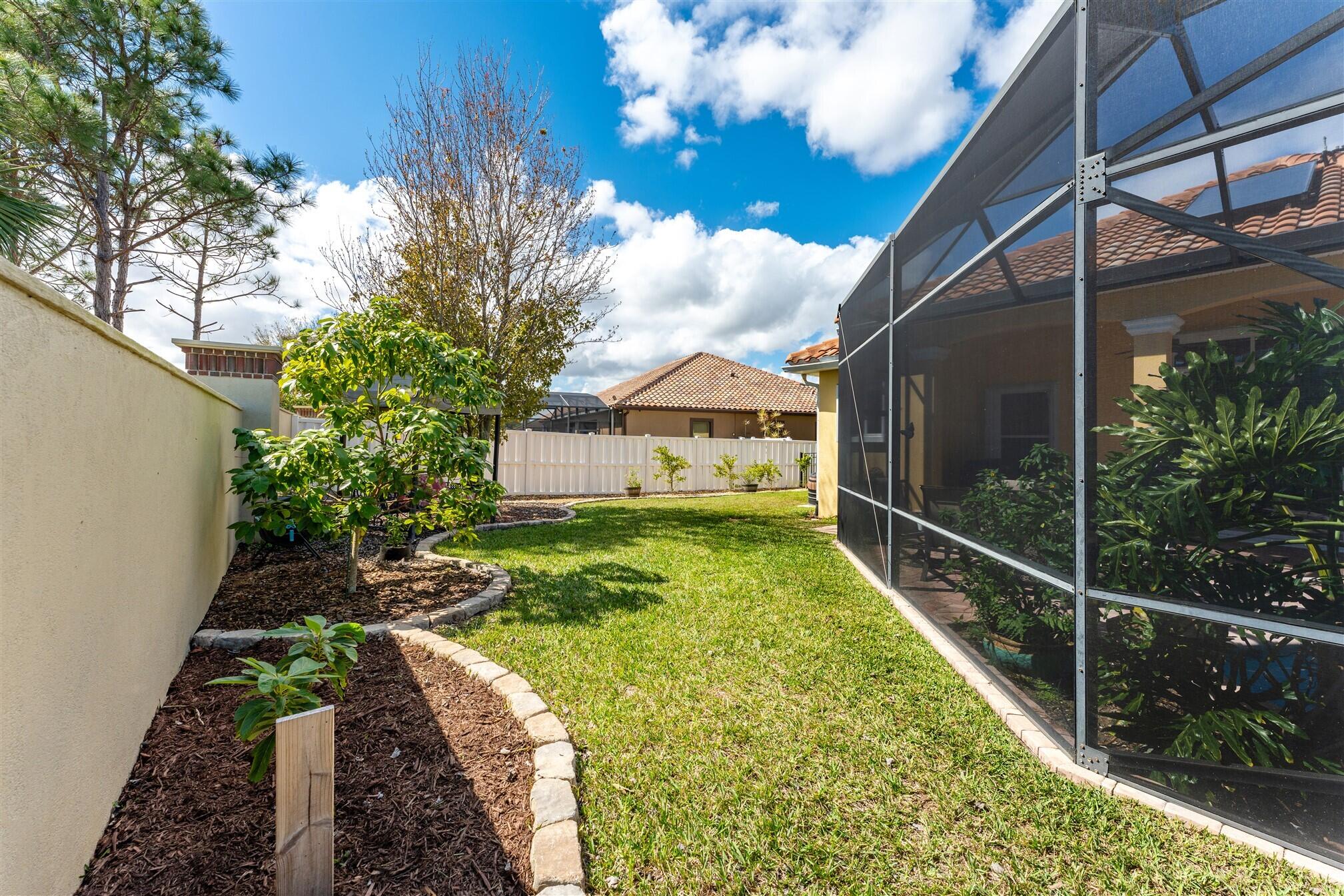 3210 Levanto Drive Melbourne, FL 32940 - Photo 57 of 76 a view of a house with a backyard
