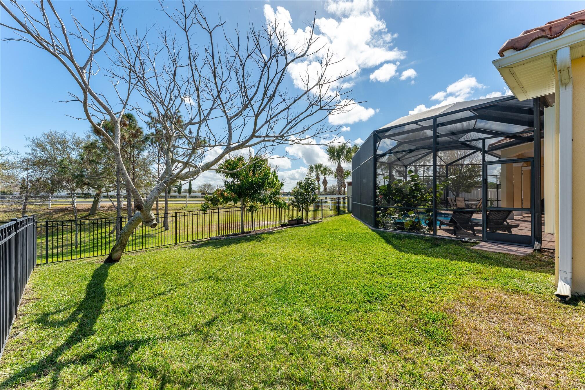 3210 Levanto Drive Melbourne, FL 32940 - Photo 60 of 76 a view of yard with swimming pool and sitting area