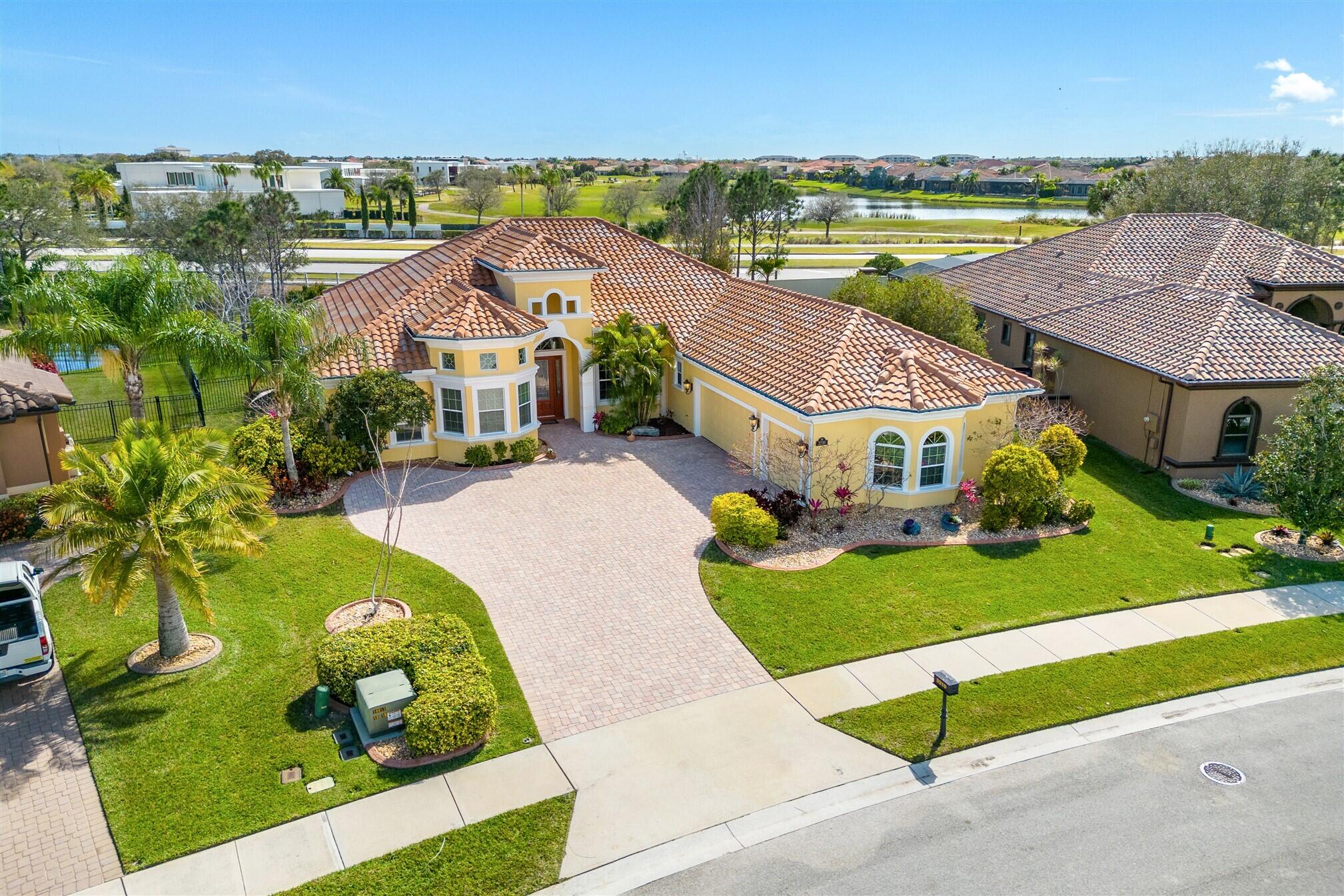 3210 Levanto Drive Melbourne, FL 32940 - Photo 63 of 76 an aerial view of a house with outdoor space pool ocean and mountain view in back