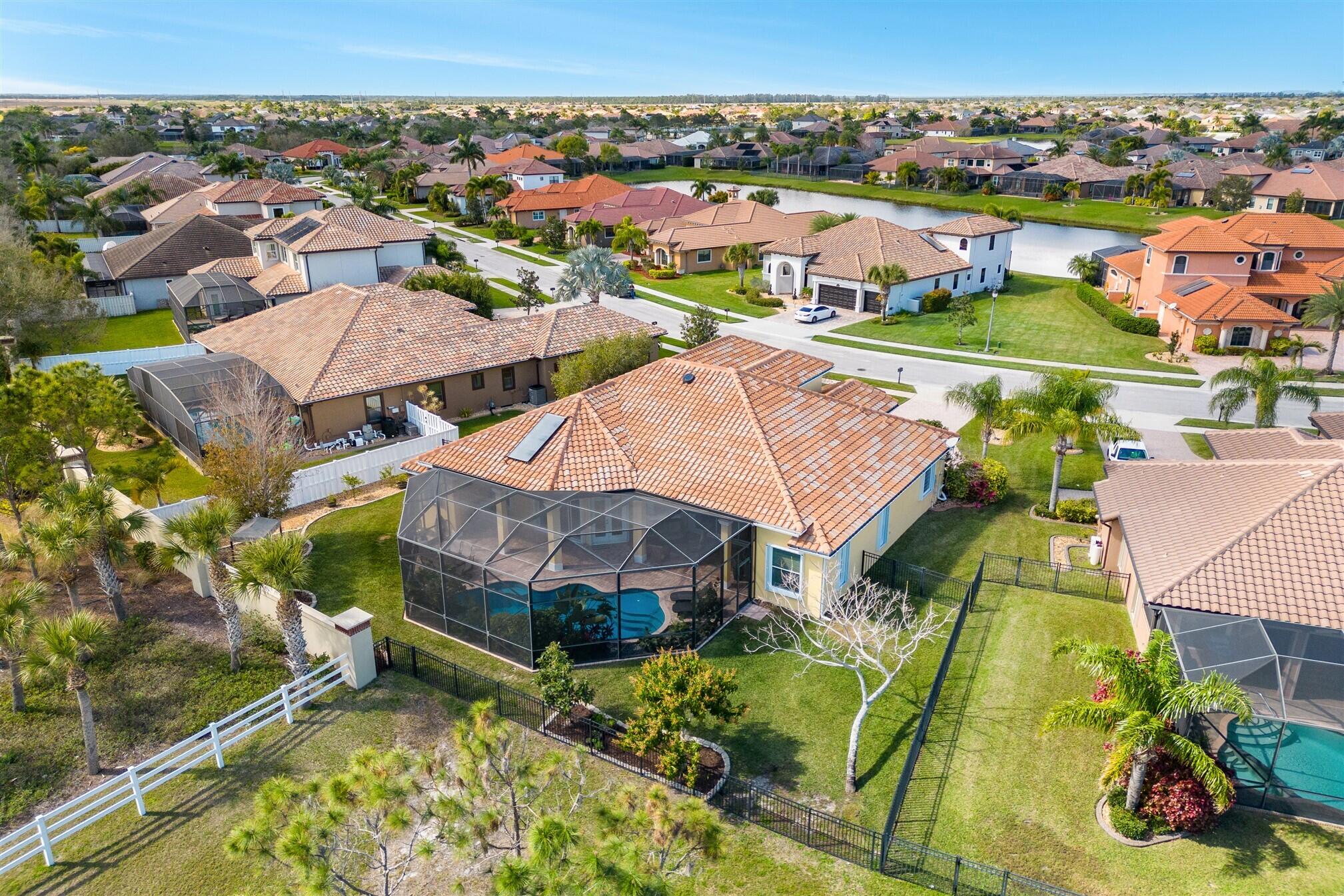3210 Levanto Drive Melbourne, FL 32940 - Photo 66 of 76 an aerial view of a house with a big yard