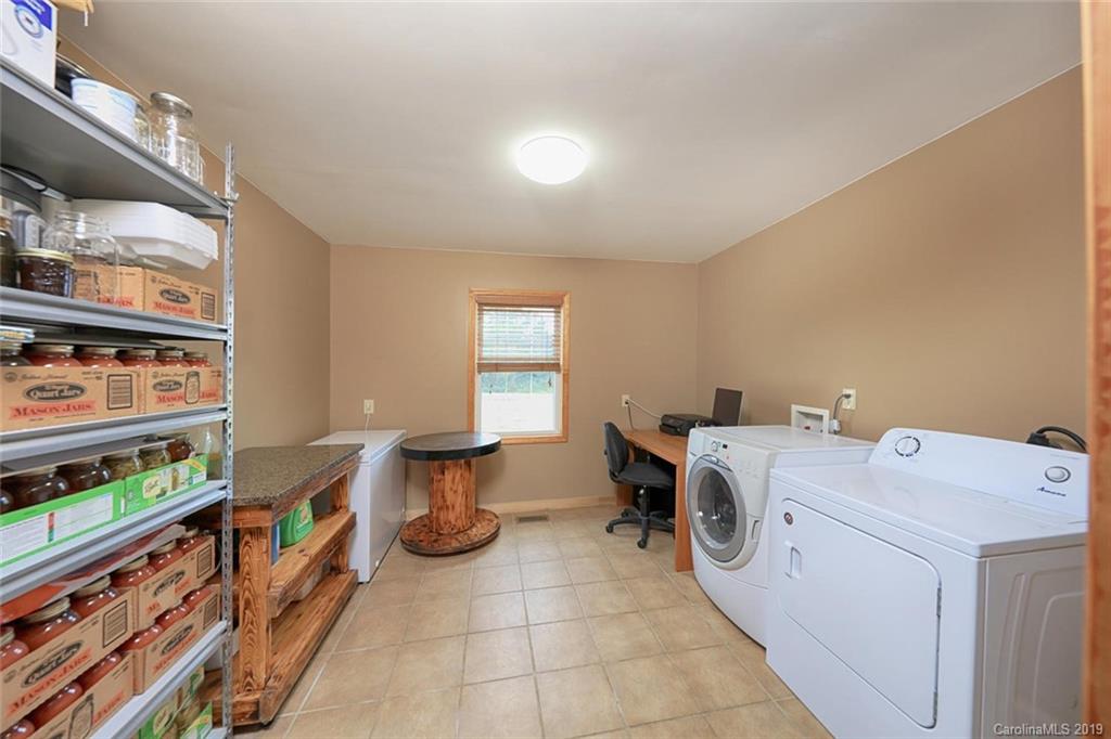 166 Stikeleather Road Stony Point, NC 28678 - Photo 27 of 48 a utility room with dryer and washer