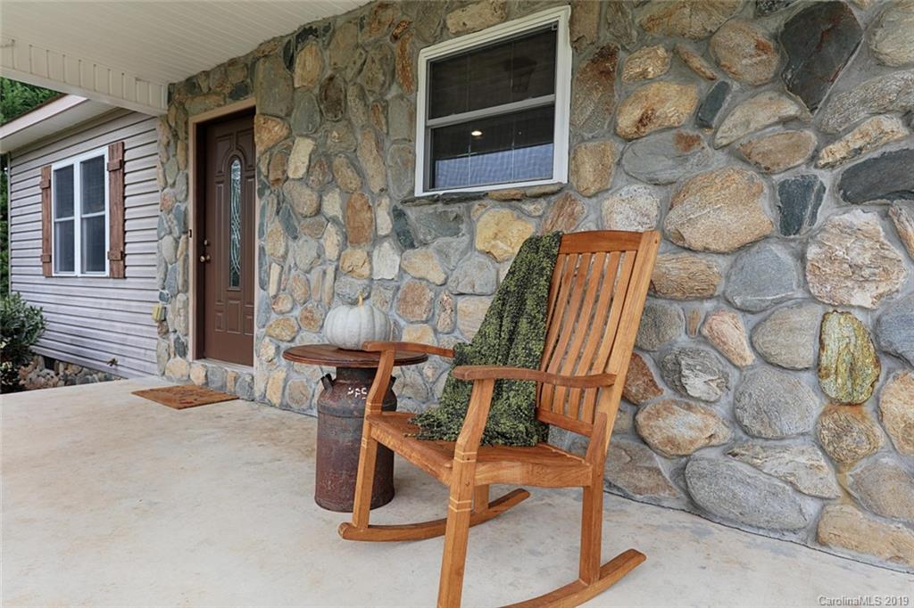 166 Stikeleather Road Stony Point, NC 28678 - Photo 5 of 48 a patio with table and chairs