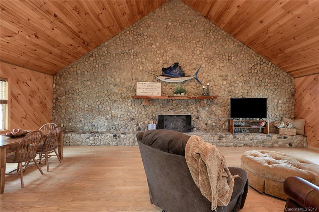166 Stikeleather Road Stony Point, NC 28678 - Photo 7 of 48 a living room with furniture and a fireplace