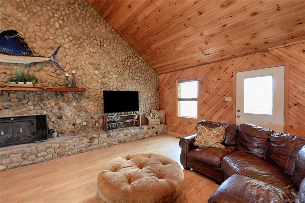 166 Stikeleather Road Stony Point, NC 28678 - Photo 8 of 48 a living room with furniture and a flat screen tv