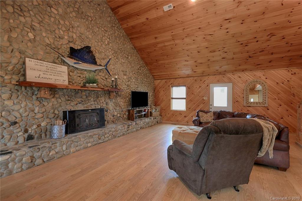 166 Stikeleather Road Stony Point, NC 28678 - Photo 9 of 48 a living room with furniture and a fireplace