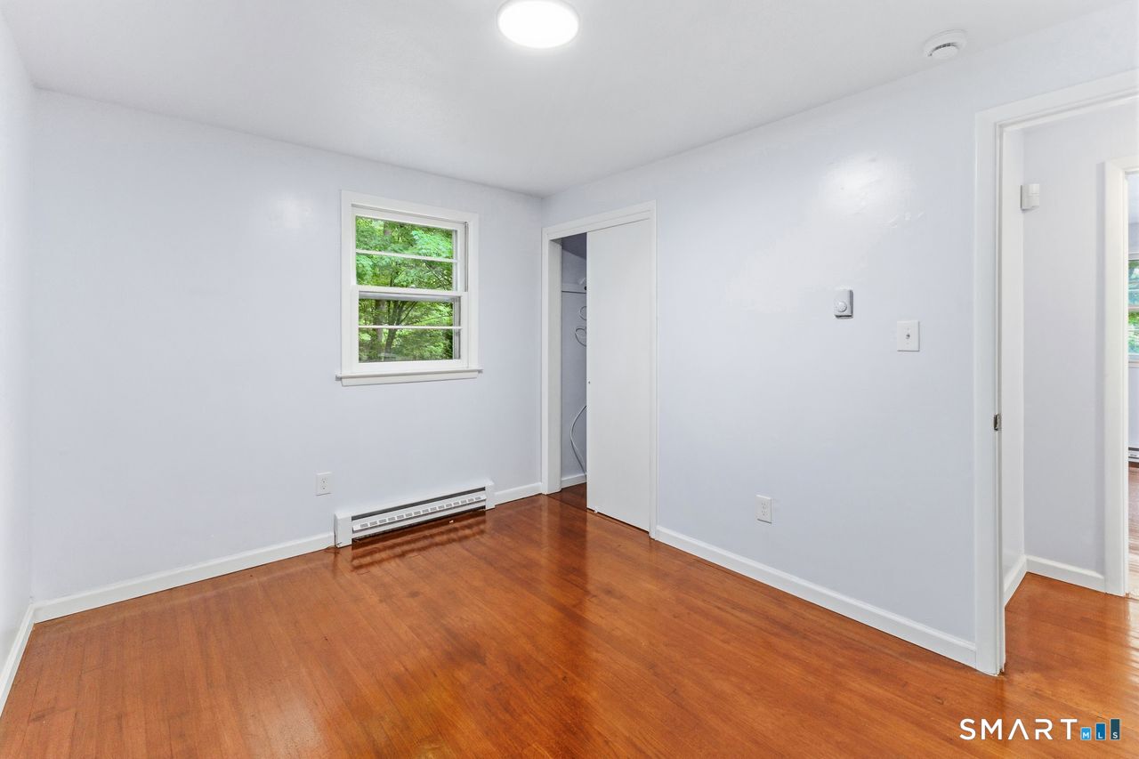 17 Rhoda Lane Bristol, CT 06010 - Photo 12 of 22 an empty room with a window