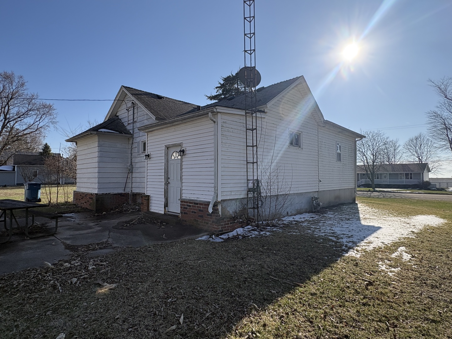4020 Wesley Freebairn Road Earlville, IL 60518 - Photo 4 of 6 a view of a house with backyard and garden
