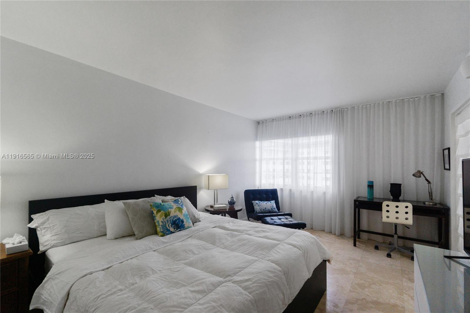 100 Lincoln Road, Unit 847 Miami Beach, FL 33139 - Photo 10 of 23 a bedroom with a bed and a window