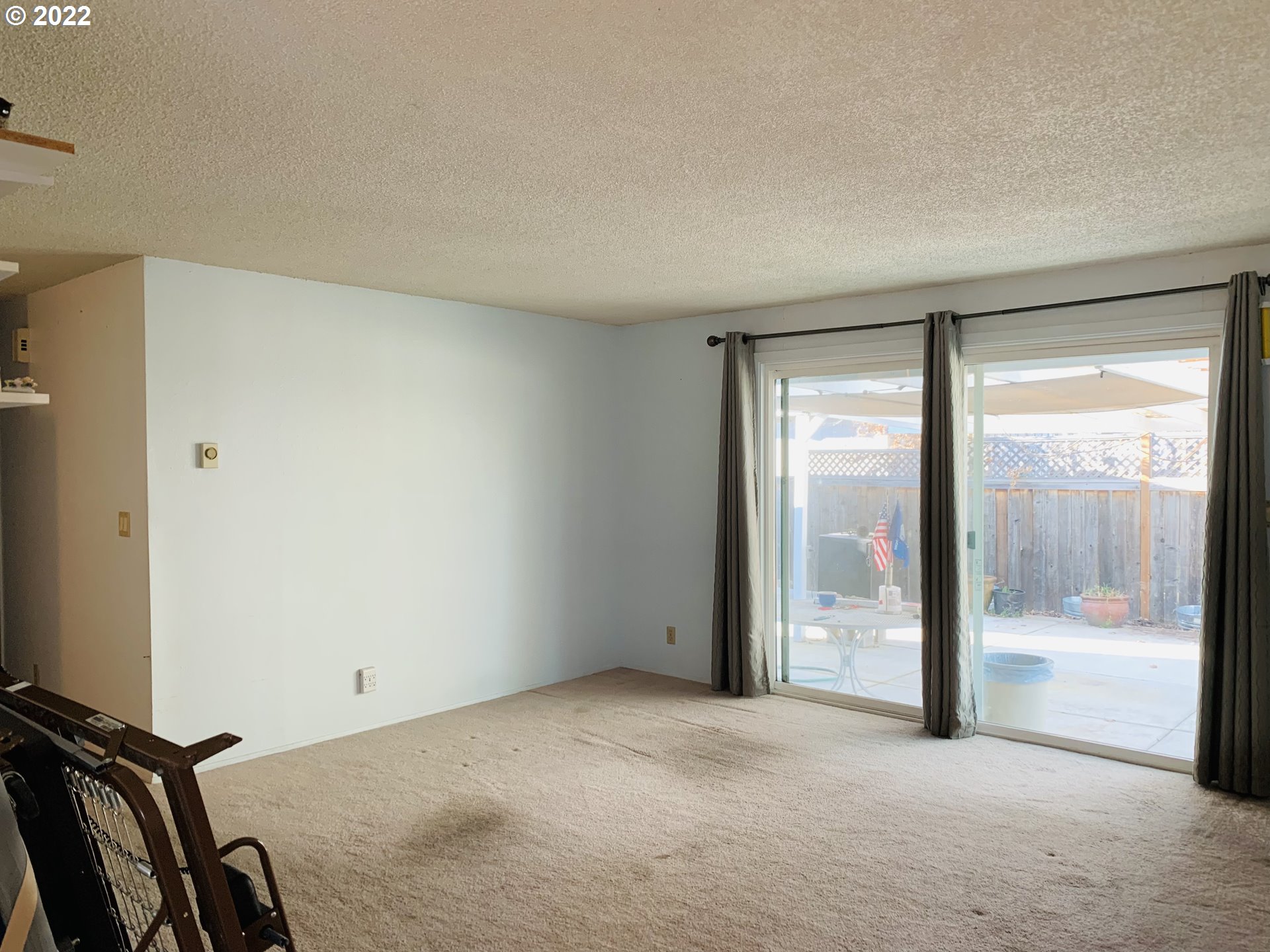 458 West Olympic Street Springfield, OR 97477 - Photo 5 of 23 a view of a room with floor to ceiling window
