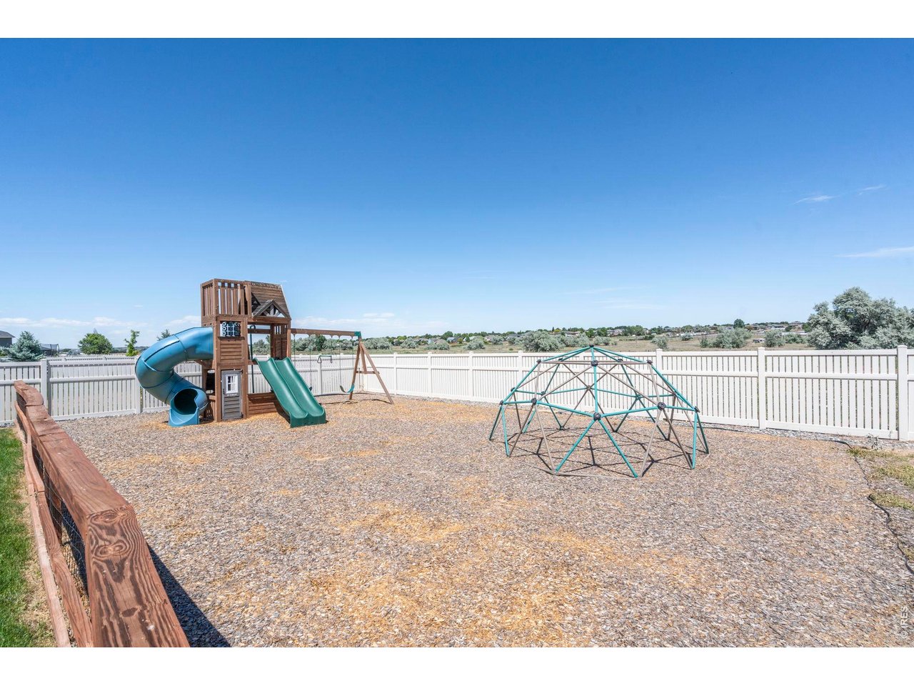 10080 Cedar Street Firestone, CO 80504 - Photo 37 of 38 Kids dedicated play area for a place of their own with open space behind the home