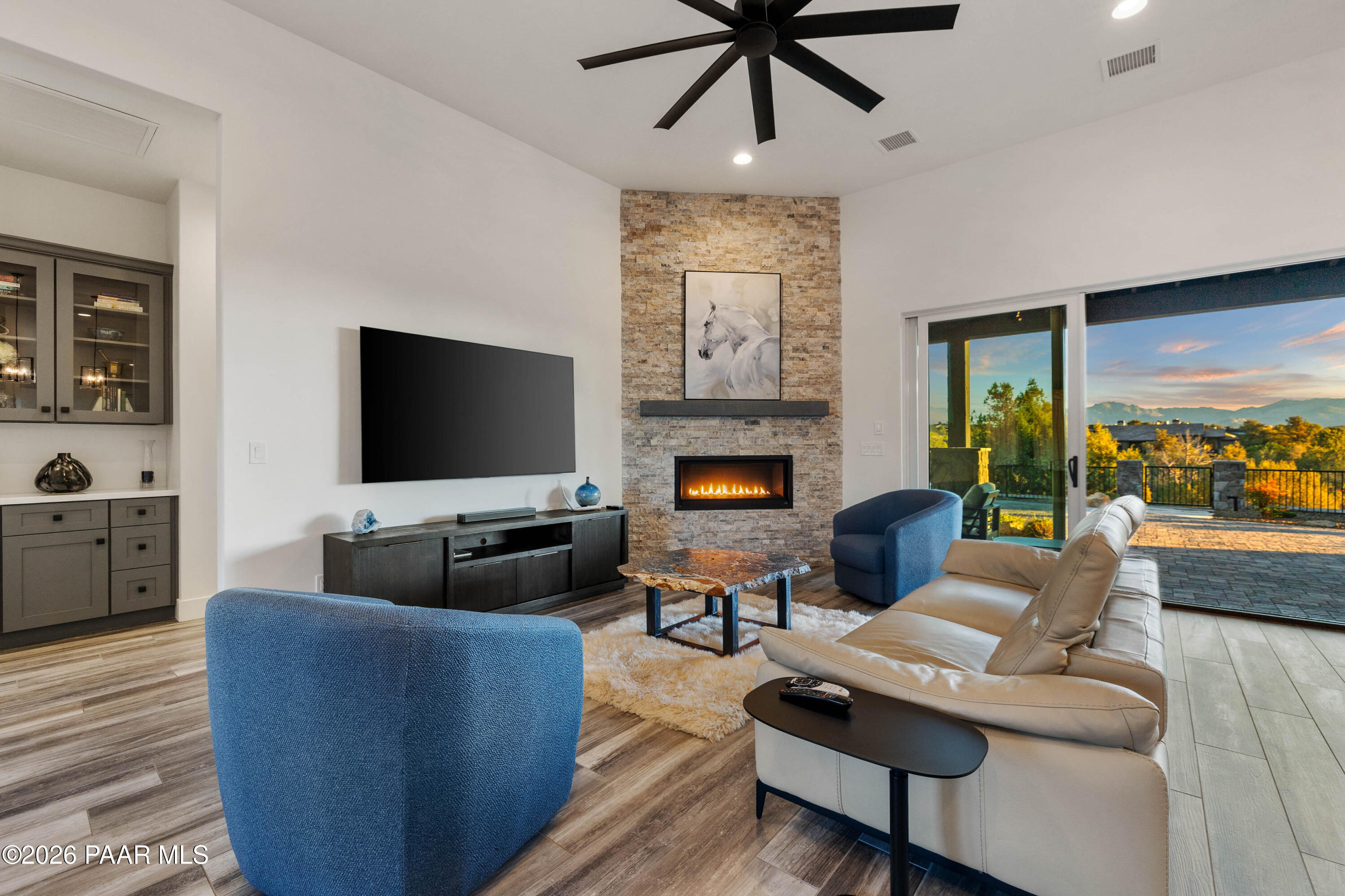 5475 West Three Forks Road Prescott, AZ 86305 - Photo 17 of 65 a living room with furniture and a flat screen tv