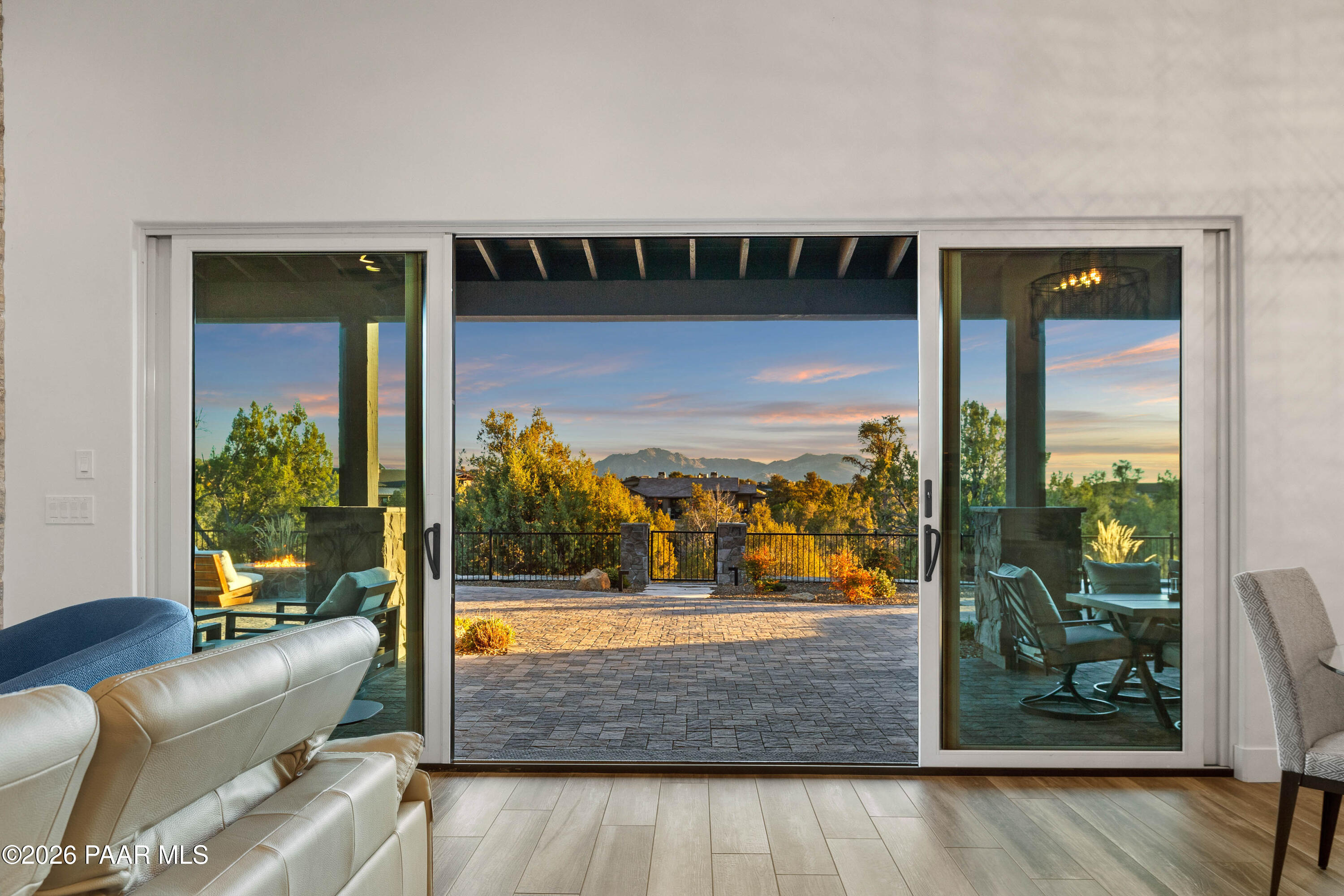 5475 West Three Forks Road Prescott, AZ 86305 - Photo 19 of 65 a view of living room kitchen with furniture and a potted plant