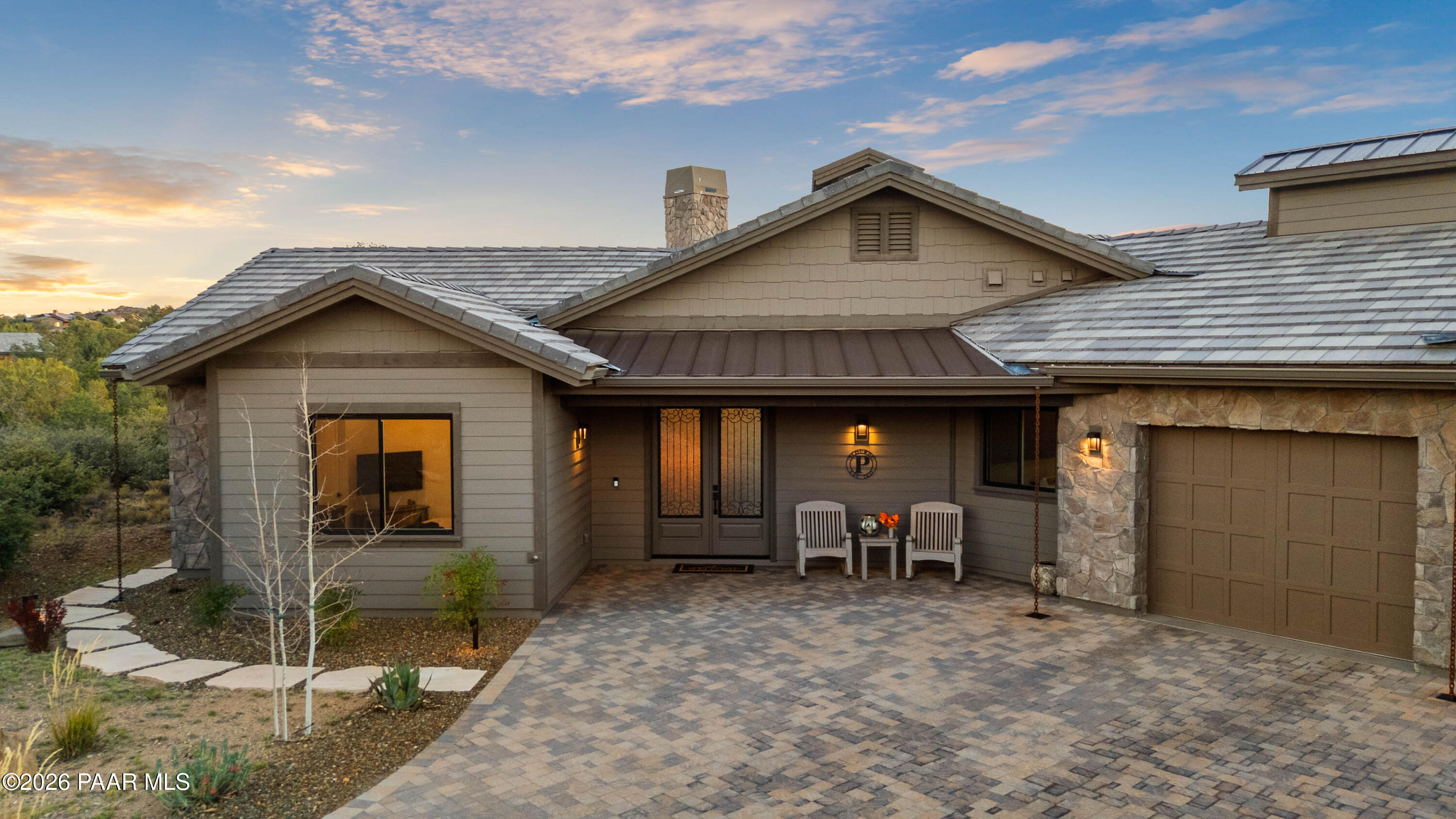 5475 West Three Forks Road Prescott, AZ 86305 - Photo 2 of 65 a view of a house with a patio and a yard