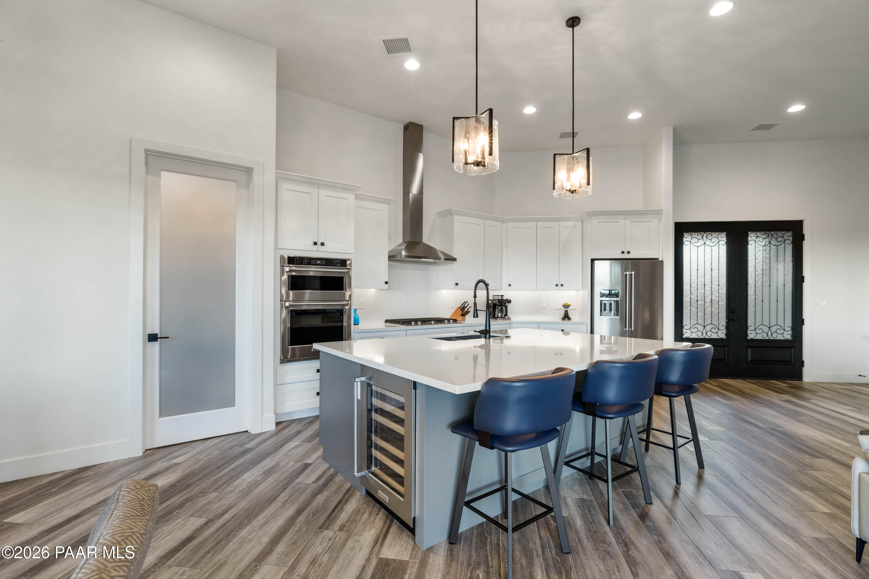 5475 West Three Forks Road Prescott, AZ 86305 - Photo 24 of 65 a large kitchen with a table and chairs