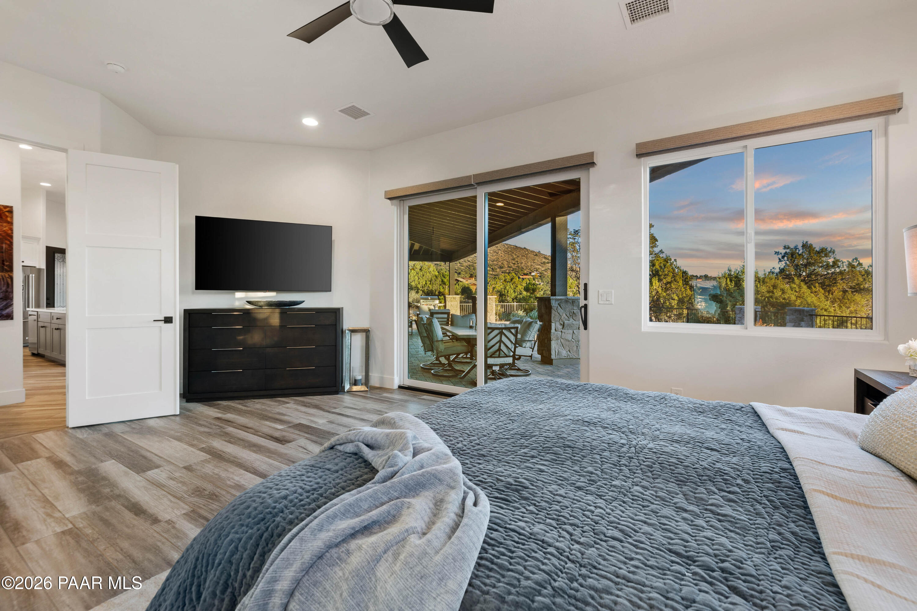 5475 West Three Forks Road Prescott, AZ 86305 - Photo 32 of 65 a bedroom with a bed and a flat screen tv