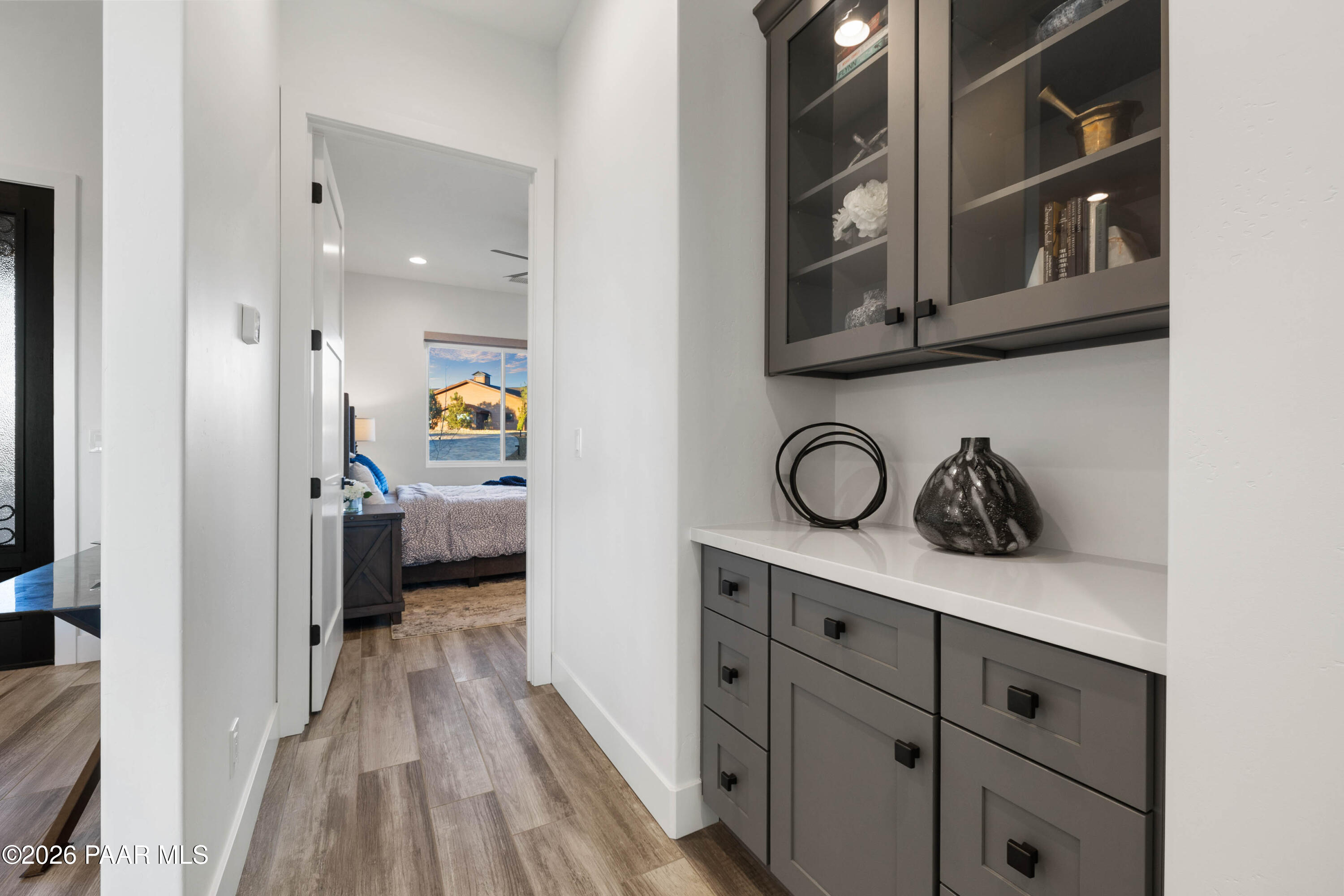 5475 West Three Forks Road Prescott, AZ 86305 - Photo 39 of 65 a en suite bathroom with a sink and a mirror