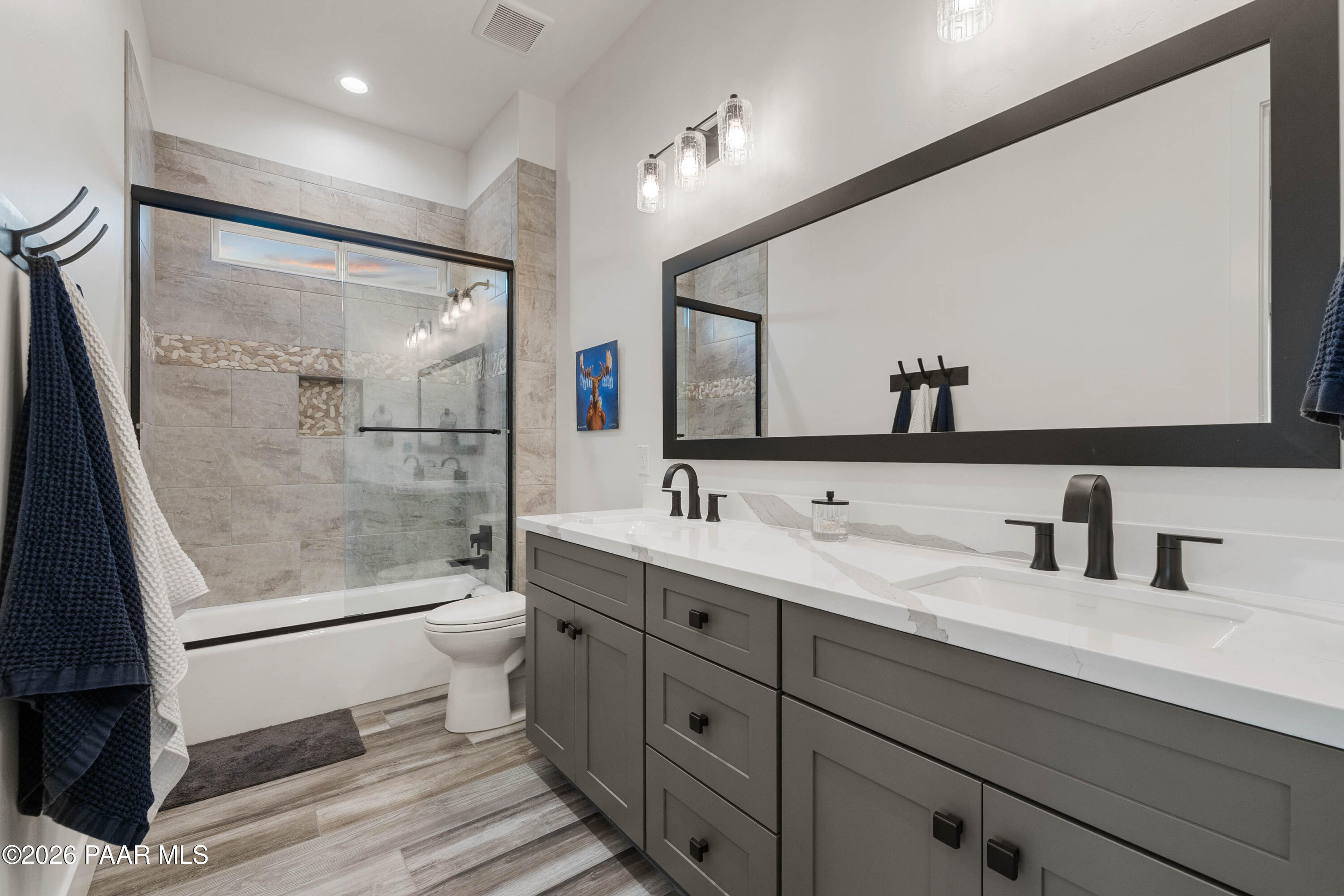 5475 West Three Forks Road Prescott, AZ 86305 - Photo 42 of 65 a bathroom with a double vanity sink mirror and toilet