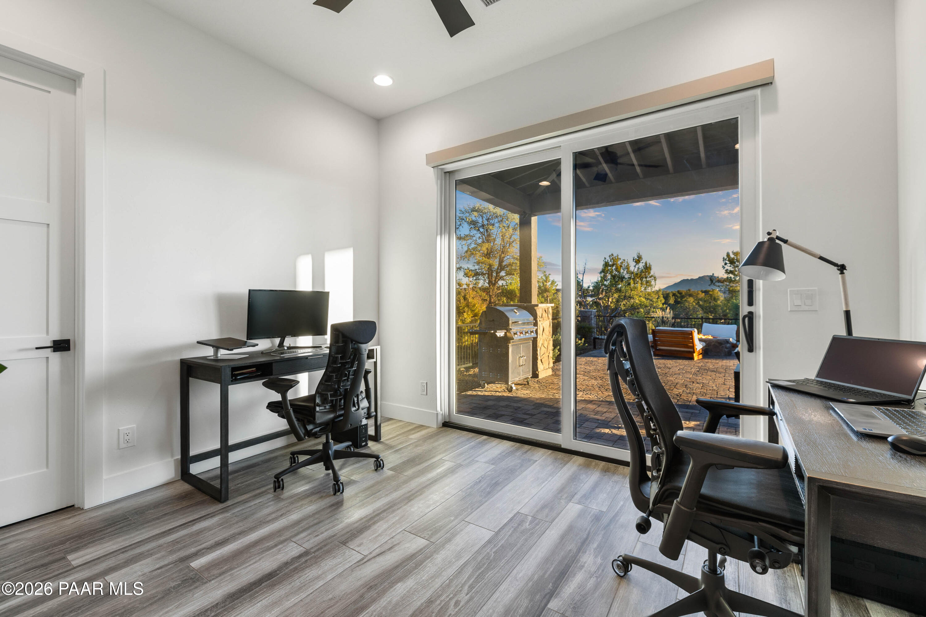 5475 West Three Forks Road Prescott, AZ 86305 - Photo 44 of 65 a view of a workspace with furniture and a window