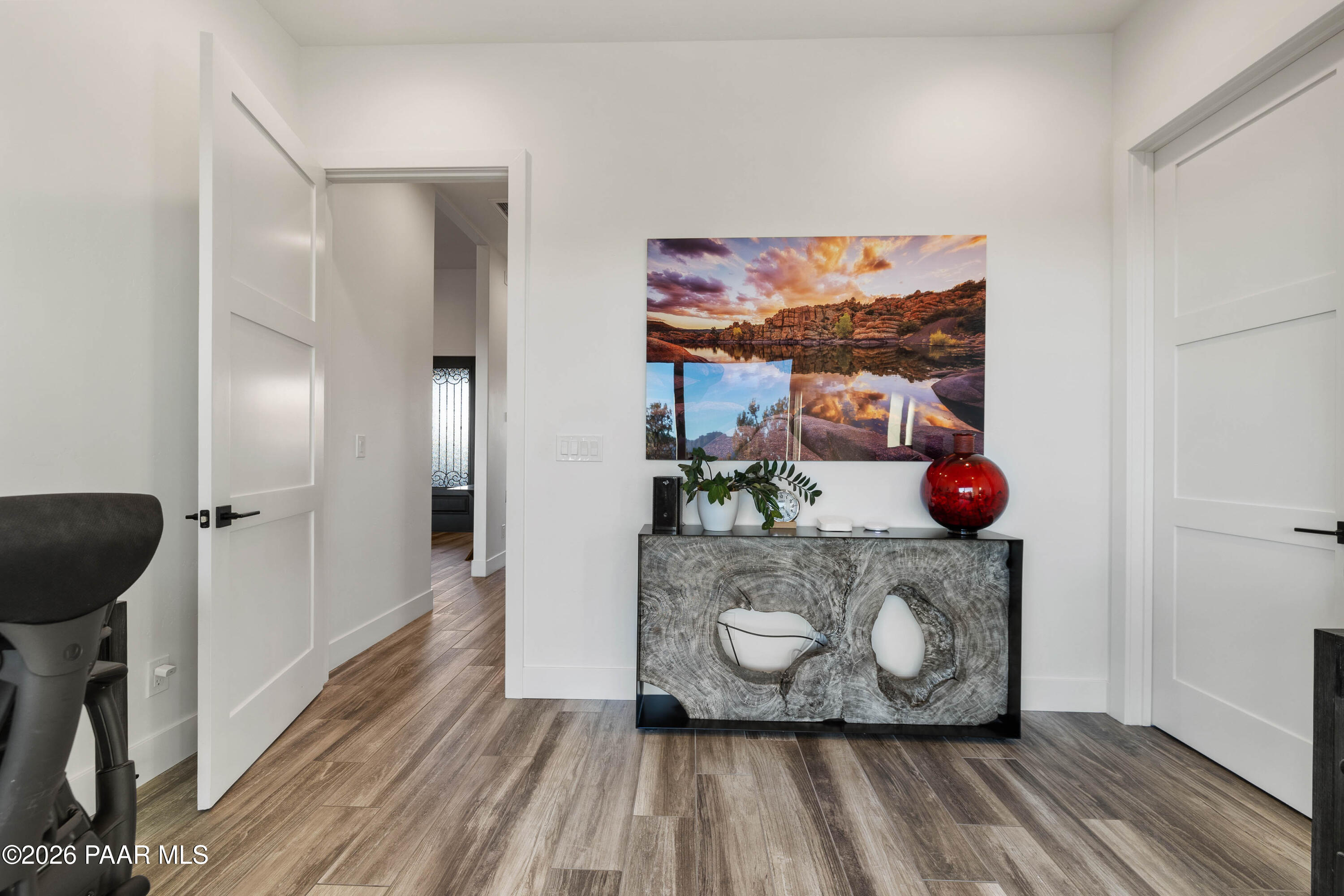 5475 West Three Forks Road Prescott, AZ 86305 - Photo 45 of 65 a room with wooden floor and cabinets