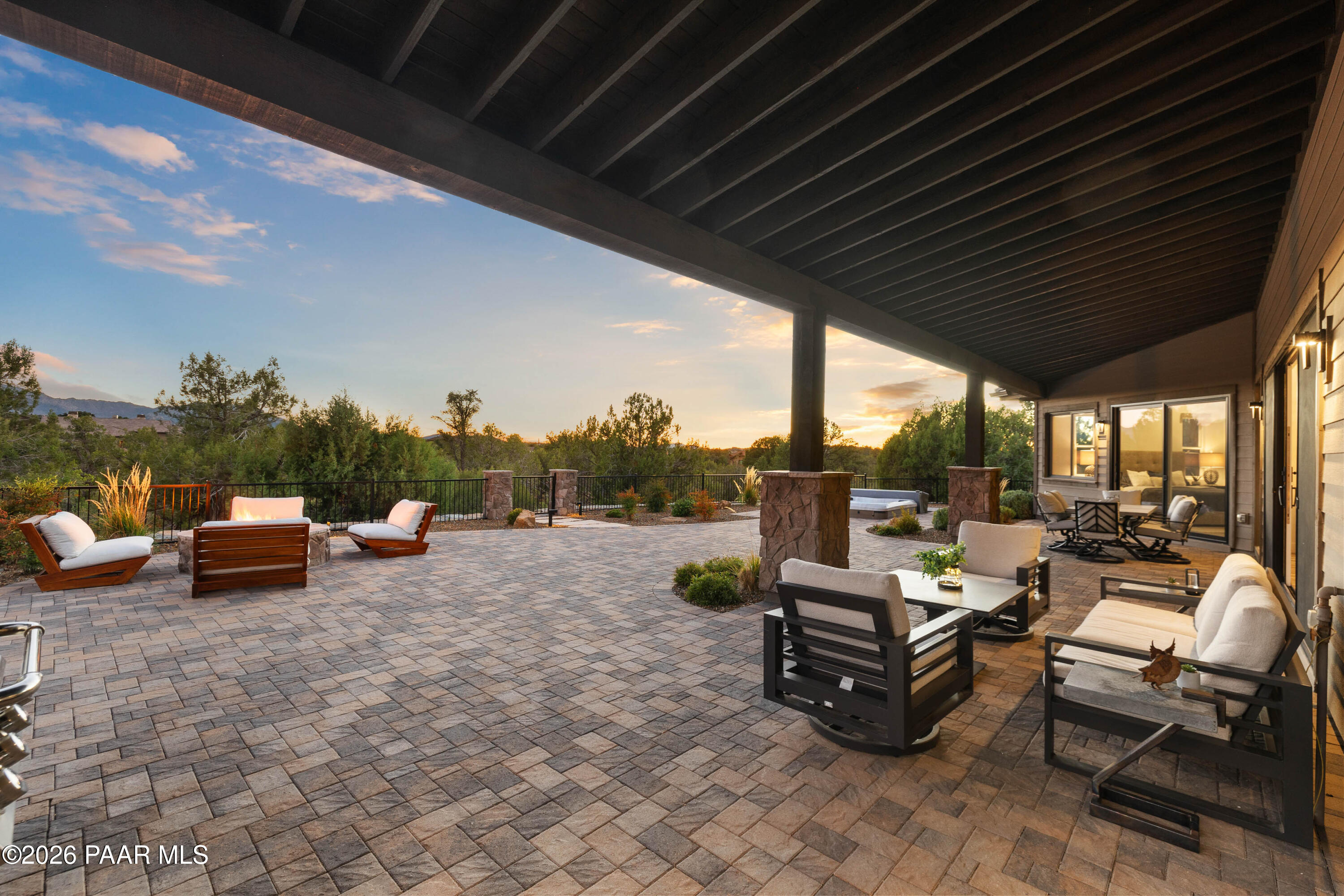 5475 West Three Forks Road Prescott, AZ 86305 - Photo 60 of 65 a living room with patio furniture and a garden